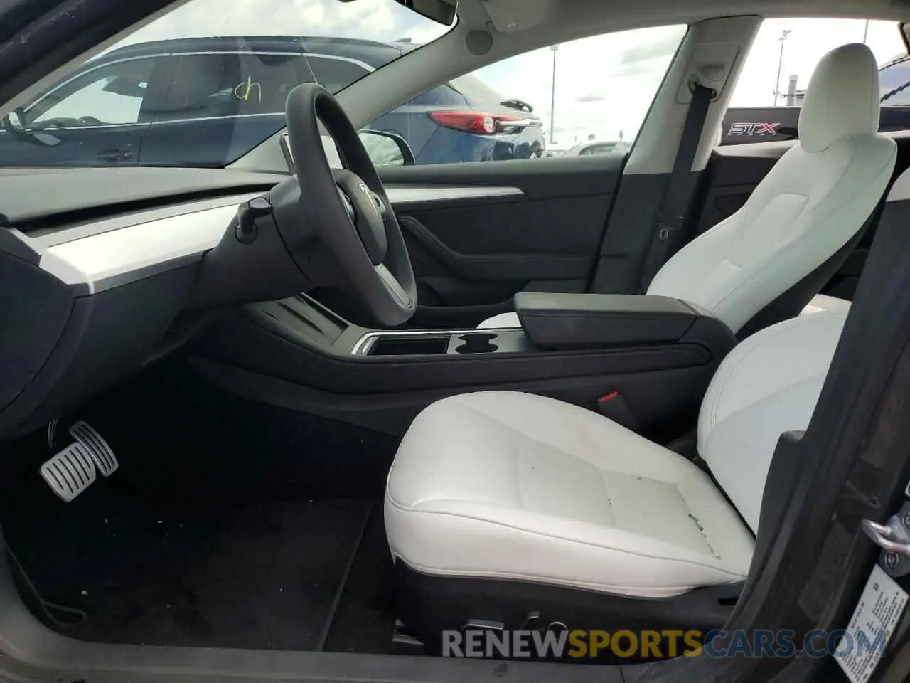 7 Photograph of a damaged car 5YJ3E1EC2PF677330 TESLA MODEL 3 2023
