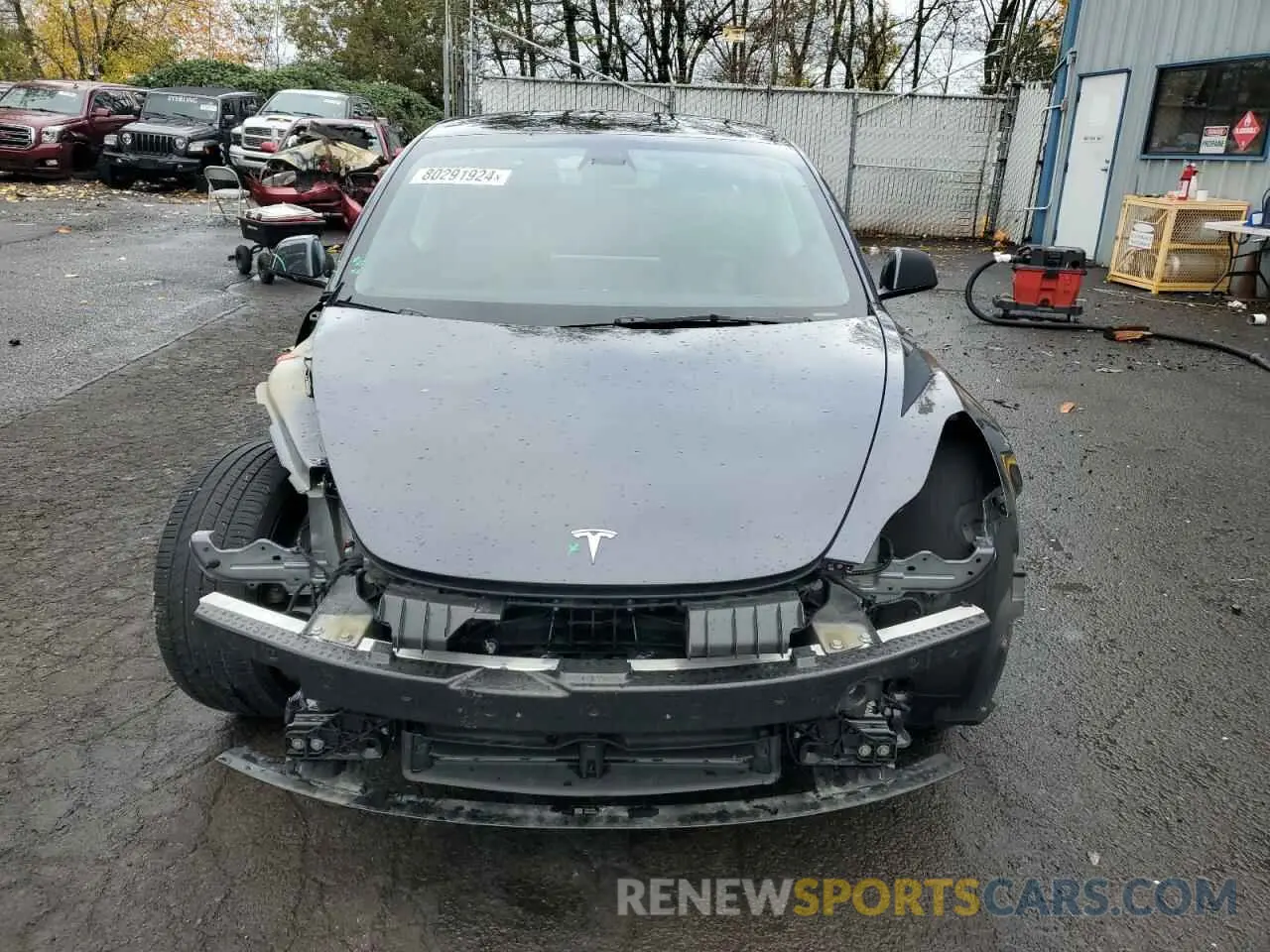 5 Photograph of a damaged car 5YJ3E1EC3PF671875 TESLA MODEL 3 2023