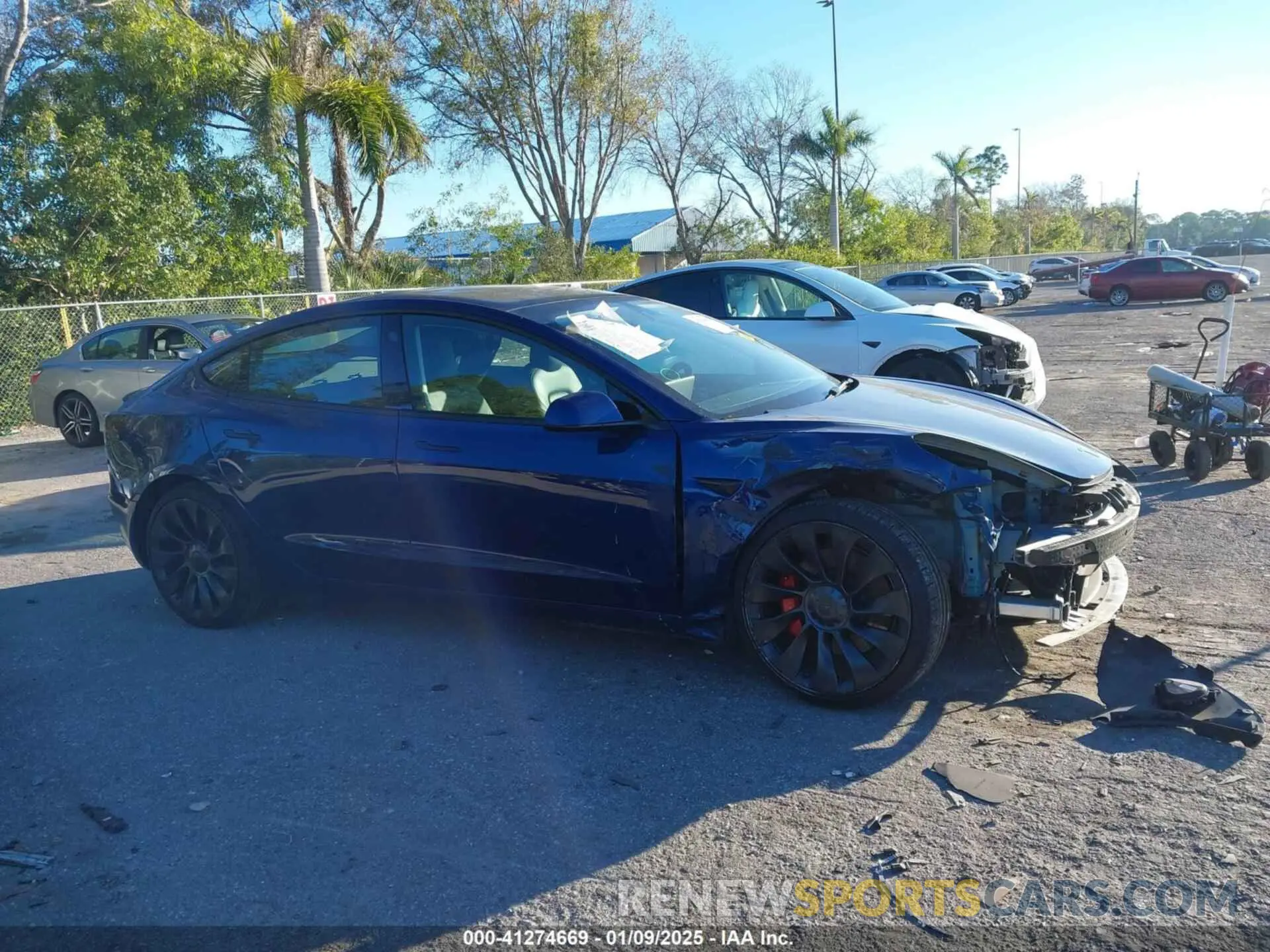 13 Photograph of a damaged car 5YJ3E1EC4PF404521 TESLA MODEL 3 2023