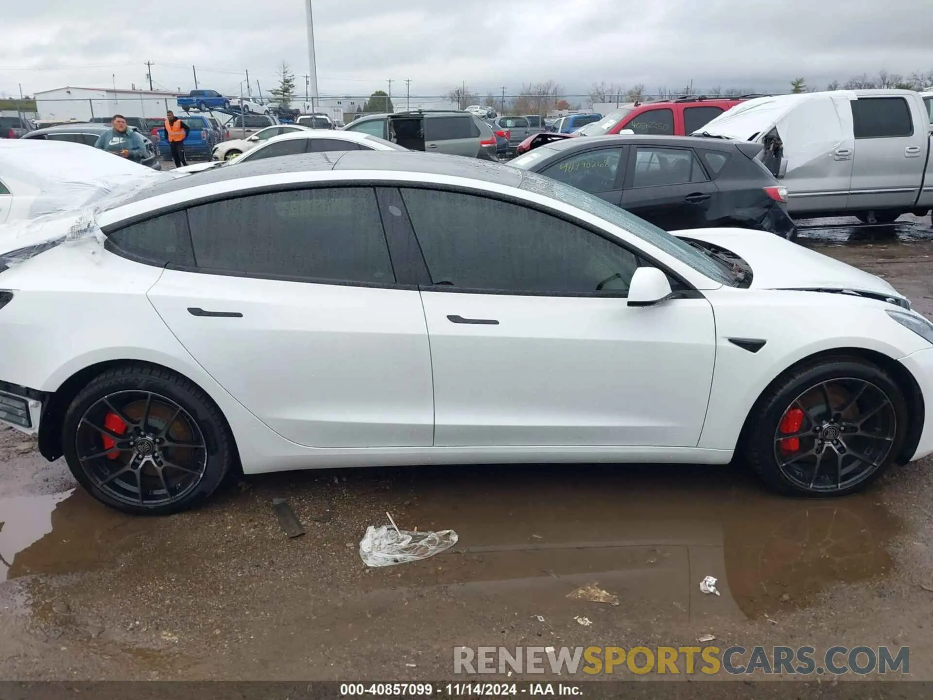 13 Photograph of a damaged car 5YJ3E1EC4PF628033 TESLA MODEL 3 2023