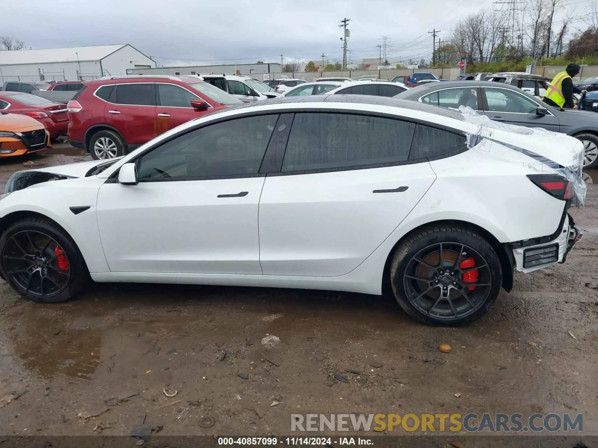 14 Photograph of a damaged car 5YJ3E1EC4PF628033 TESLA MODEL 3 2023