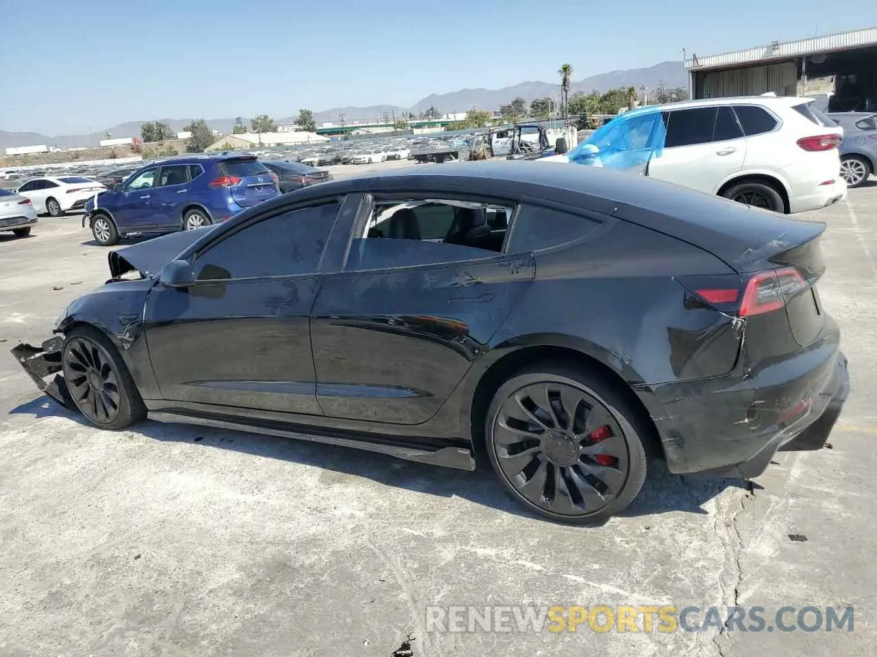 2 Photograph of a damaged car 5YJ3E1EC4PF693819 TESLA MODEL 3 2023