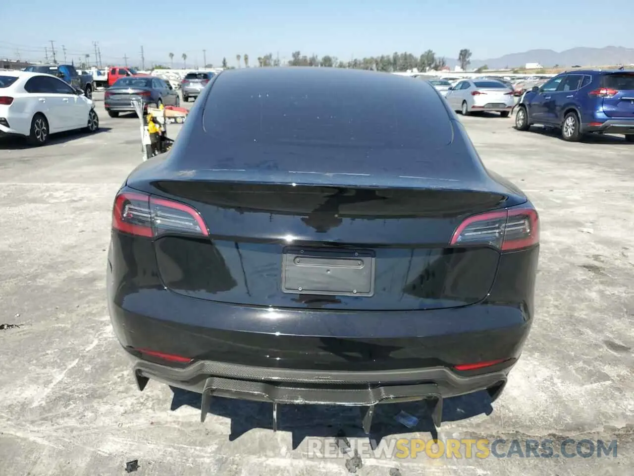 6 Photograph of a damaged car 5YJ3E1EC4PF693819 TESLA MODEL 3 2023