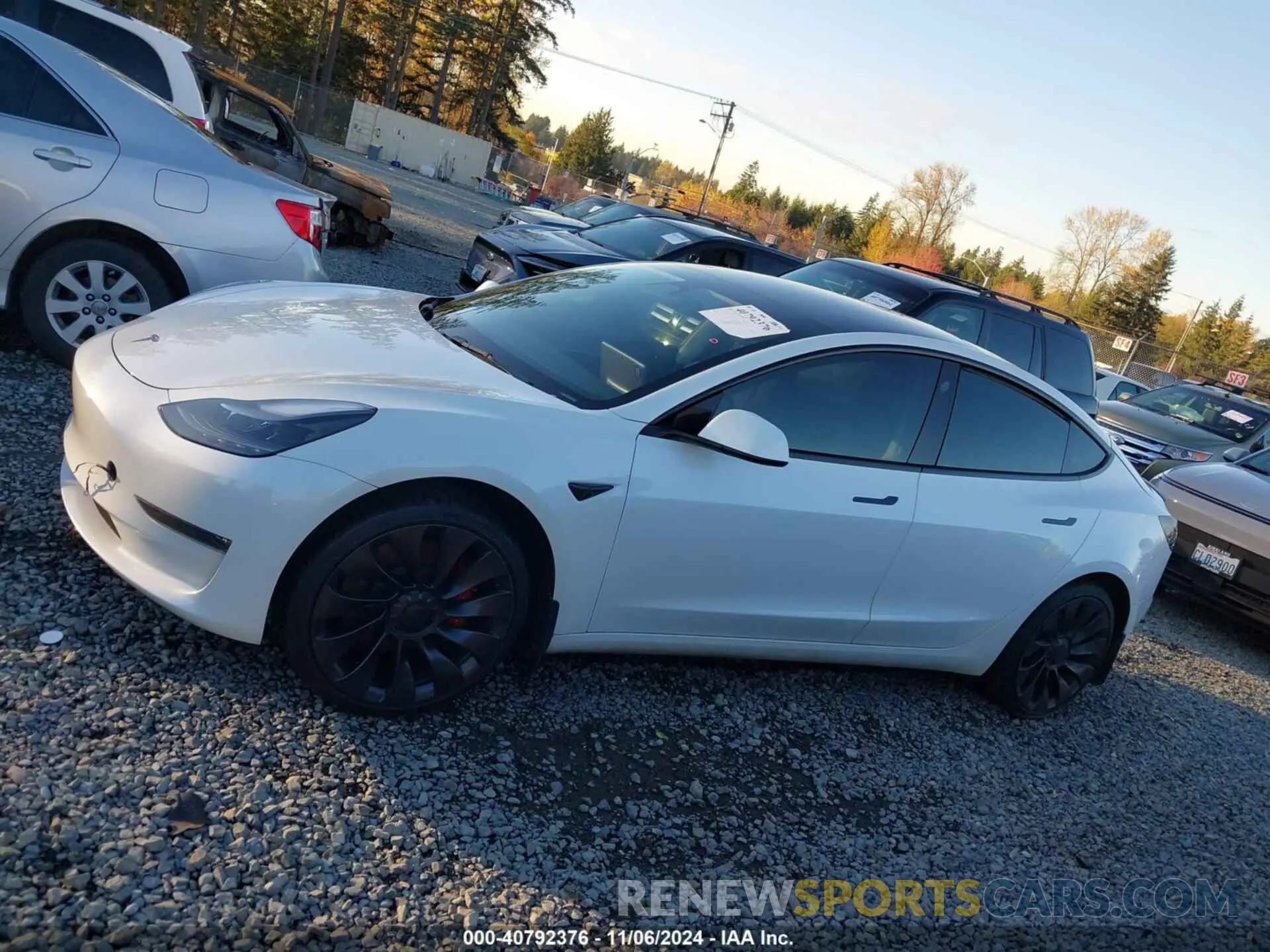 14 Photograph of a damaged car 5YJ3E1EC6PF553660 TESLA MODEL 3 2023