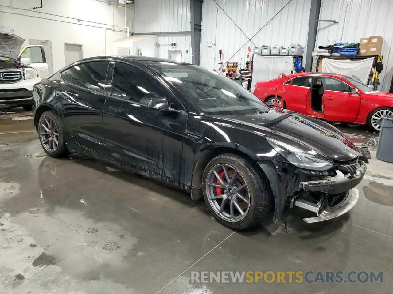 4 Photograph of a damaged car 5YJ3E1EC7PF399105 TESLA MODEL 3 2023
