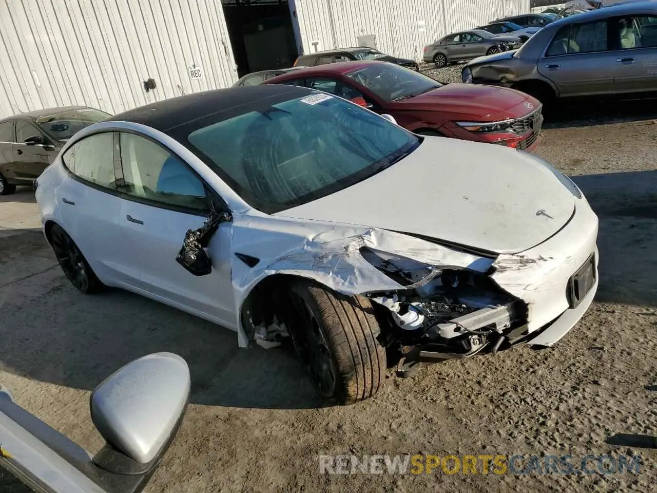 4 Photograph of a damaged car 5YJ3E1EC7PF428389 TESLA MODEL 3 2023