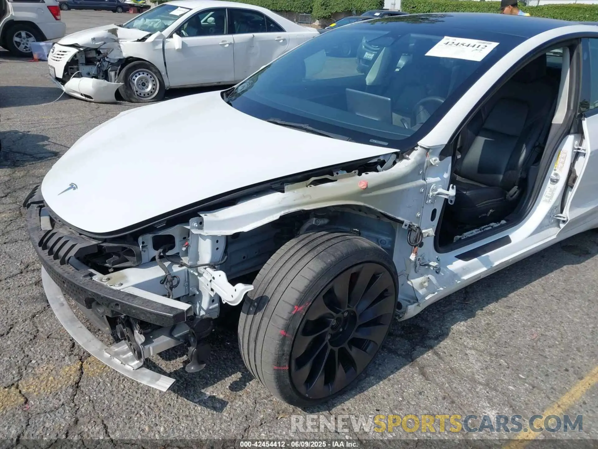6 Photograph of a damaged car 5YJ3E1EC8PF504525 TESLA MODEL 3 2023