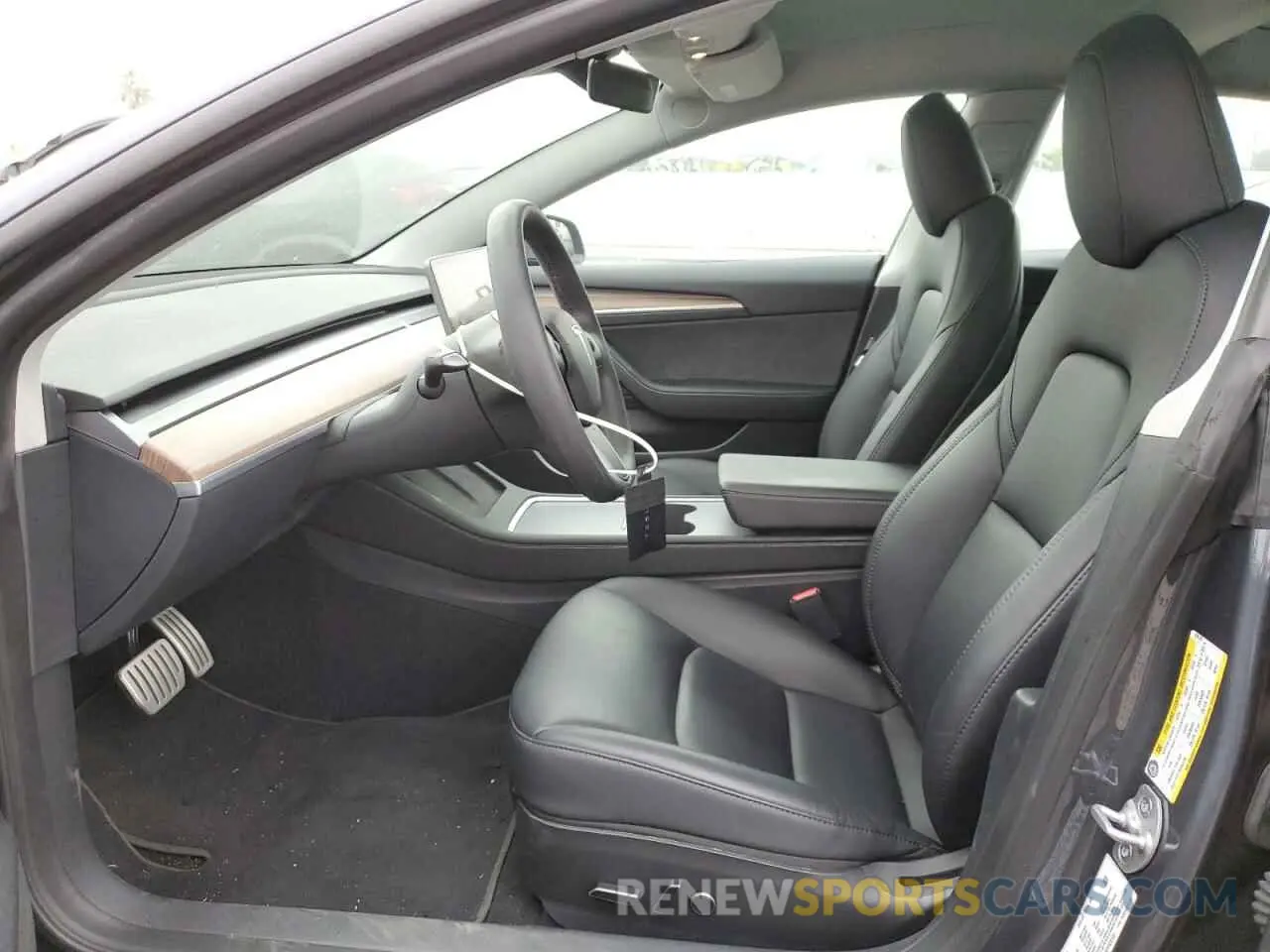 7 Photograph of a damaged car 5YJ3E1EC9PF628139 TESLA MODEL 3 2023