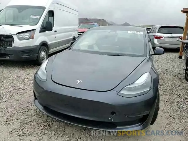 11 Photograph of a damaged car 5YJ3E1EC9PF673517 TESLA MODEL 3 2023