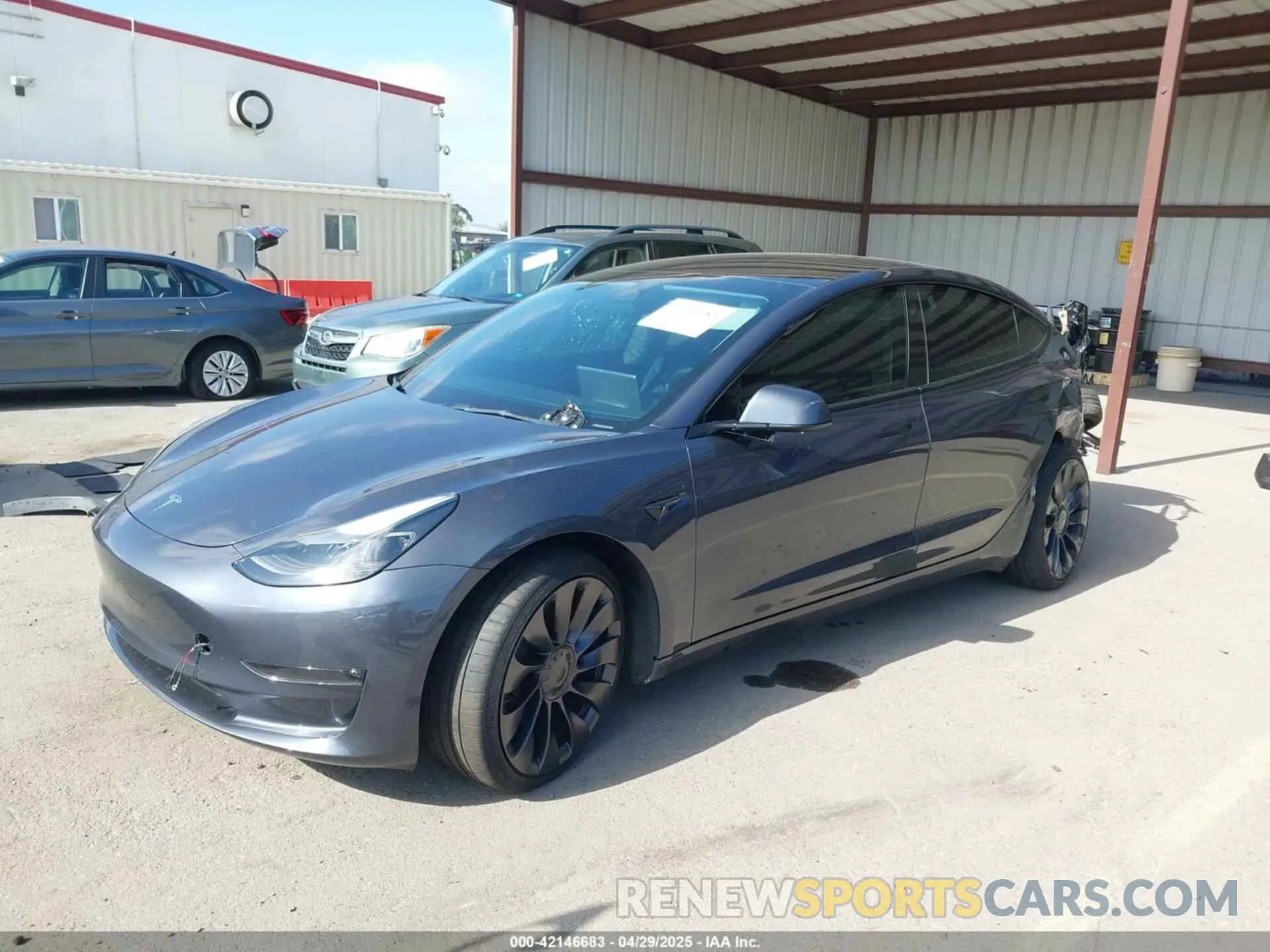2 Photograph of a damaged car 5YJ3E1ECXPF410212 TESLA MODEL 3 2023