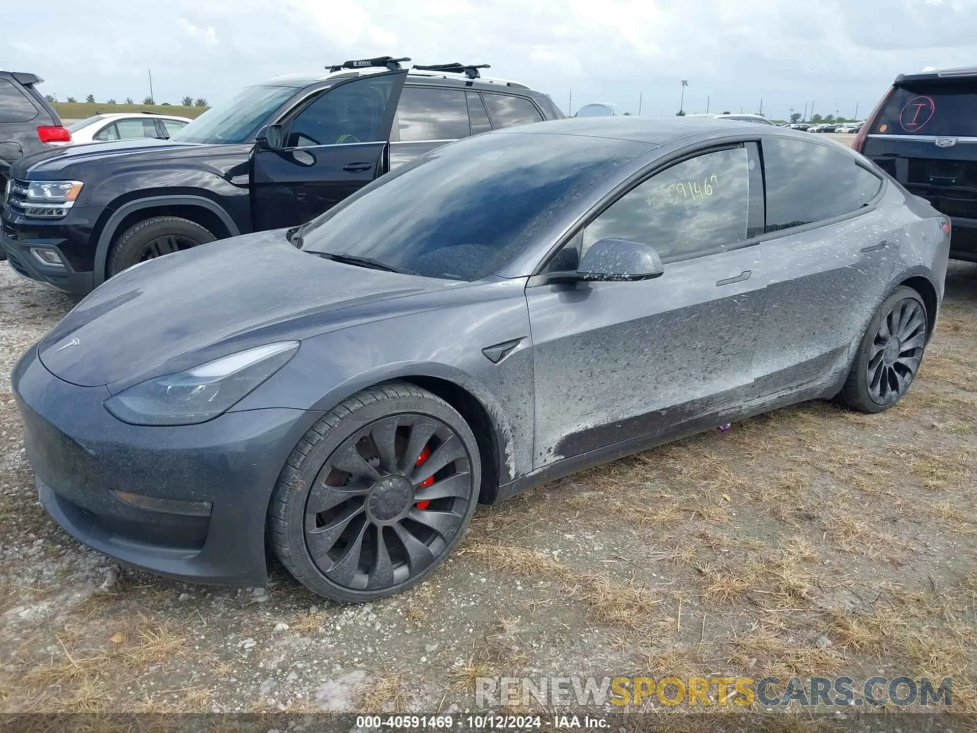 2 Photograph of a damaged car 5YJ3E1ECXPF668892 TESLA MODEL 3 2023