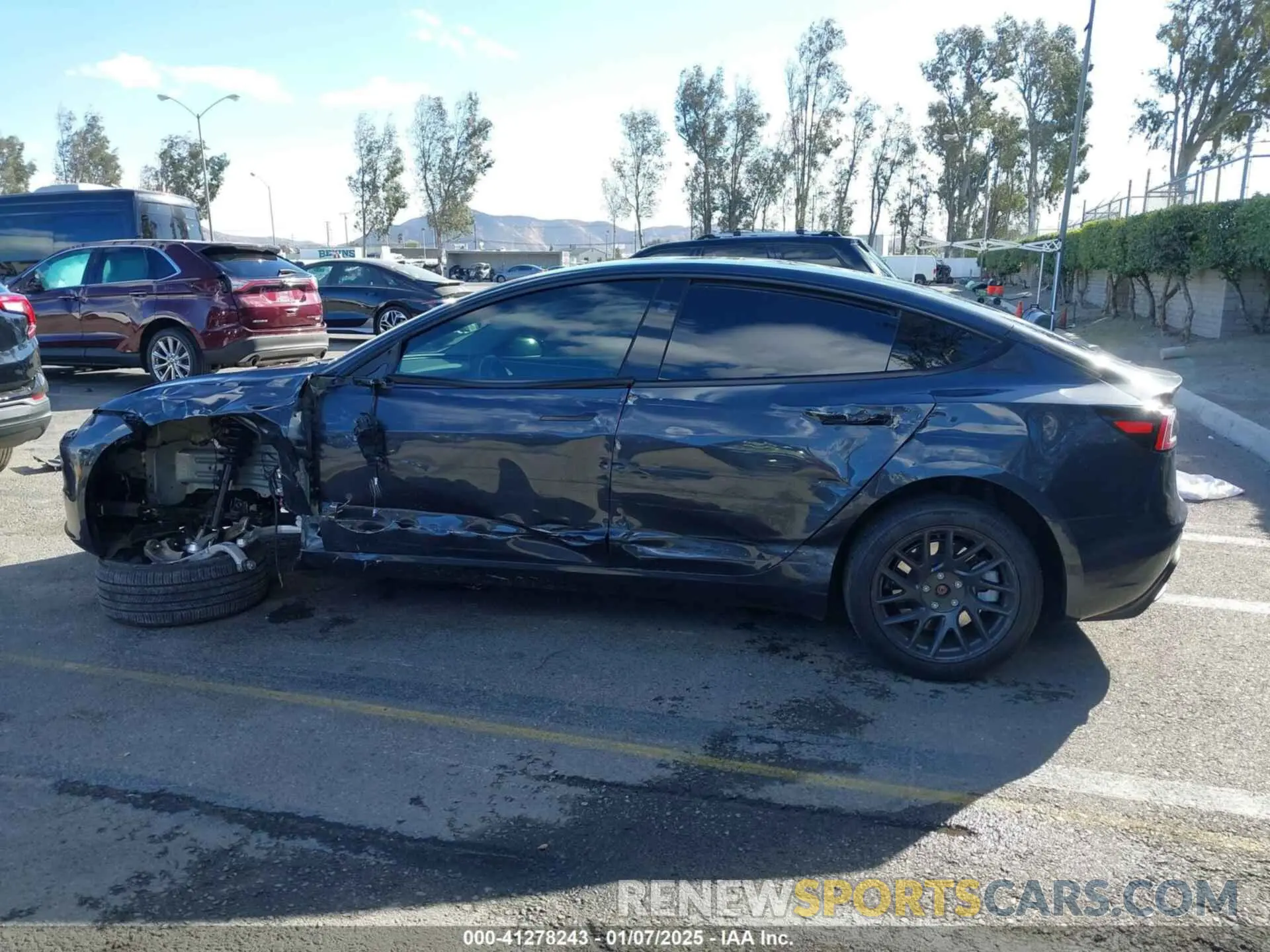 14 Photograph of a damaged car 5YJ3E1EA0RF718703 TESLA MODEL 3 2024