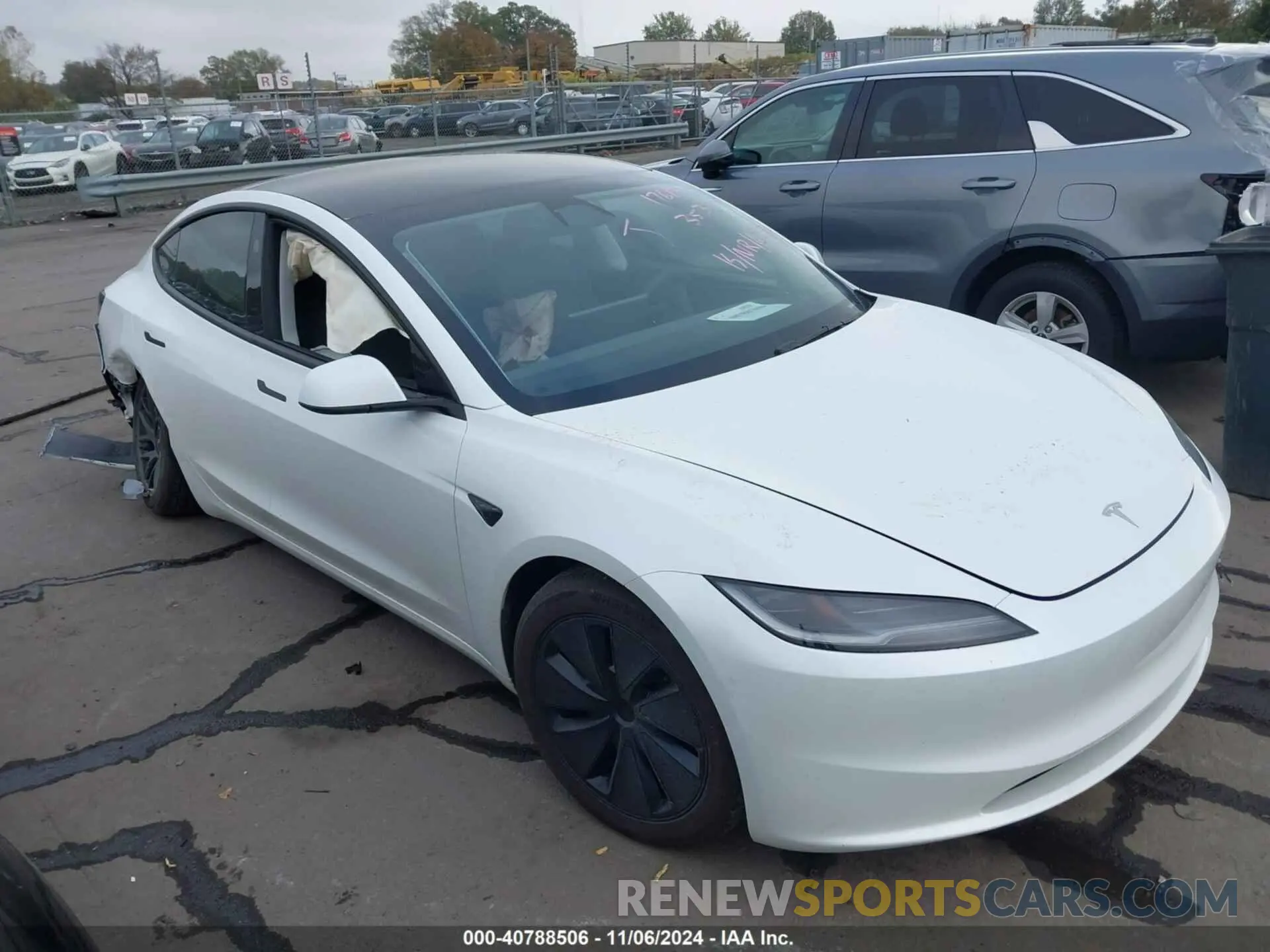 12 Photograph of a damaged car 5YJ3E1EA0RF733539 TESLA MODEL 3 2024