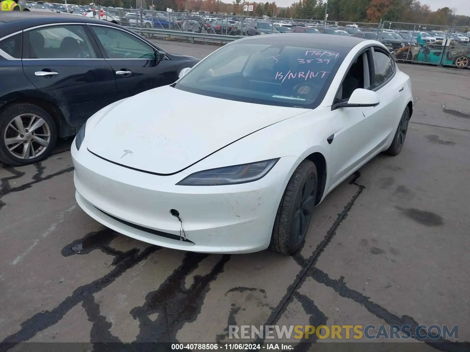 2 Photograph of a damaged car 5YJ3E1EA0RF733539 TESLA MODEL 3 2024