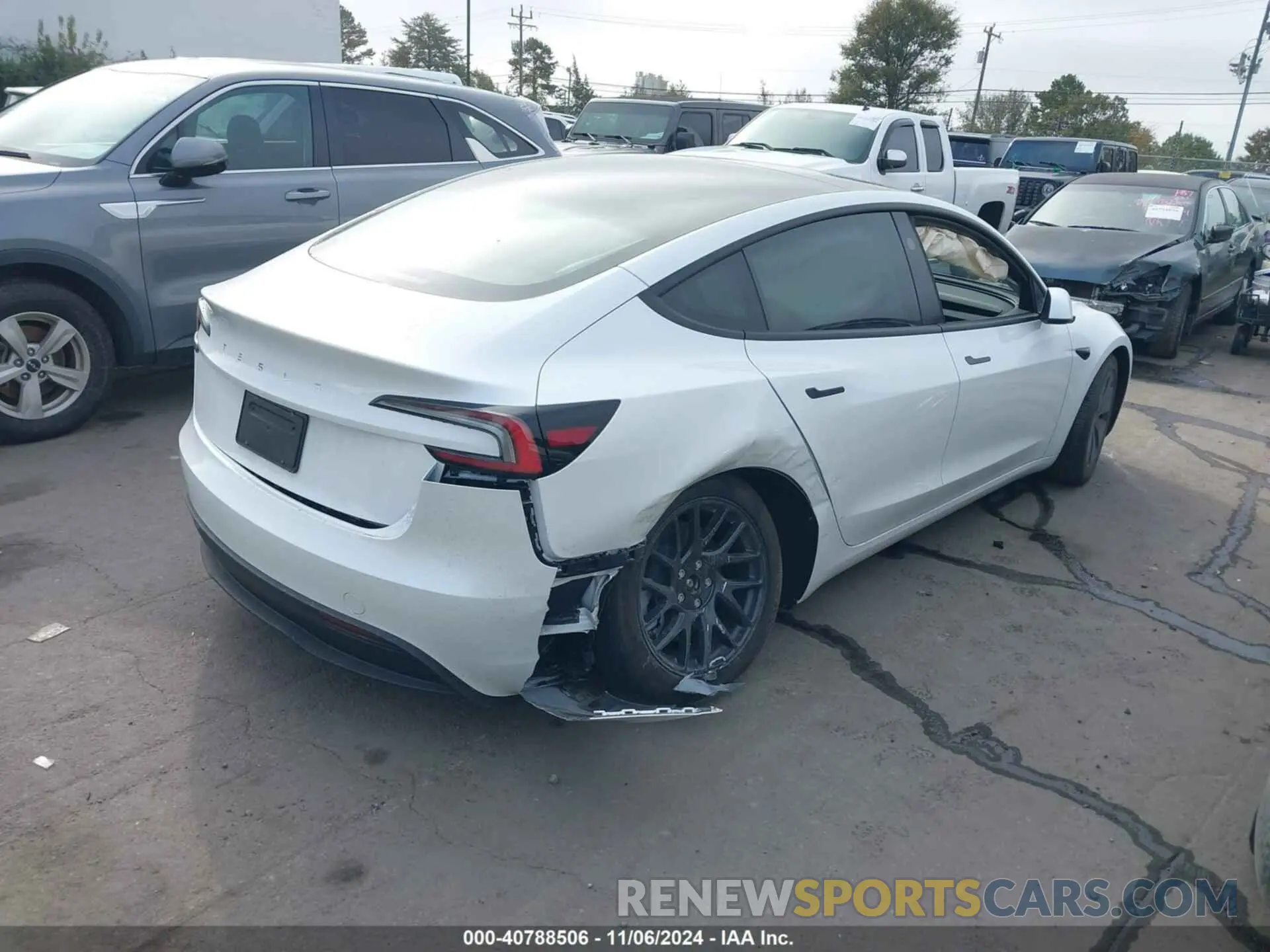 4 Photograph of a damaged car 5YJ3E1EA0RF733539 TESLA MODEL 3 2024