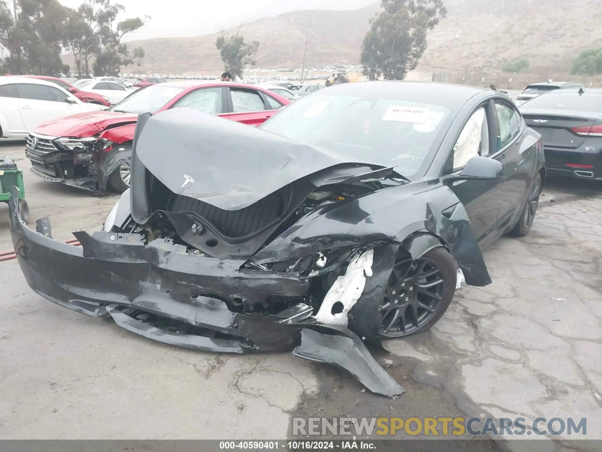 2 Photograph of a damaged car 5YJ3E1EA0RF744072 TESLA MODEL 3 2024