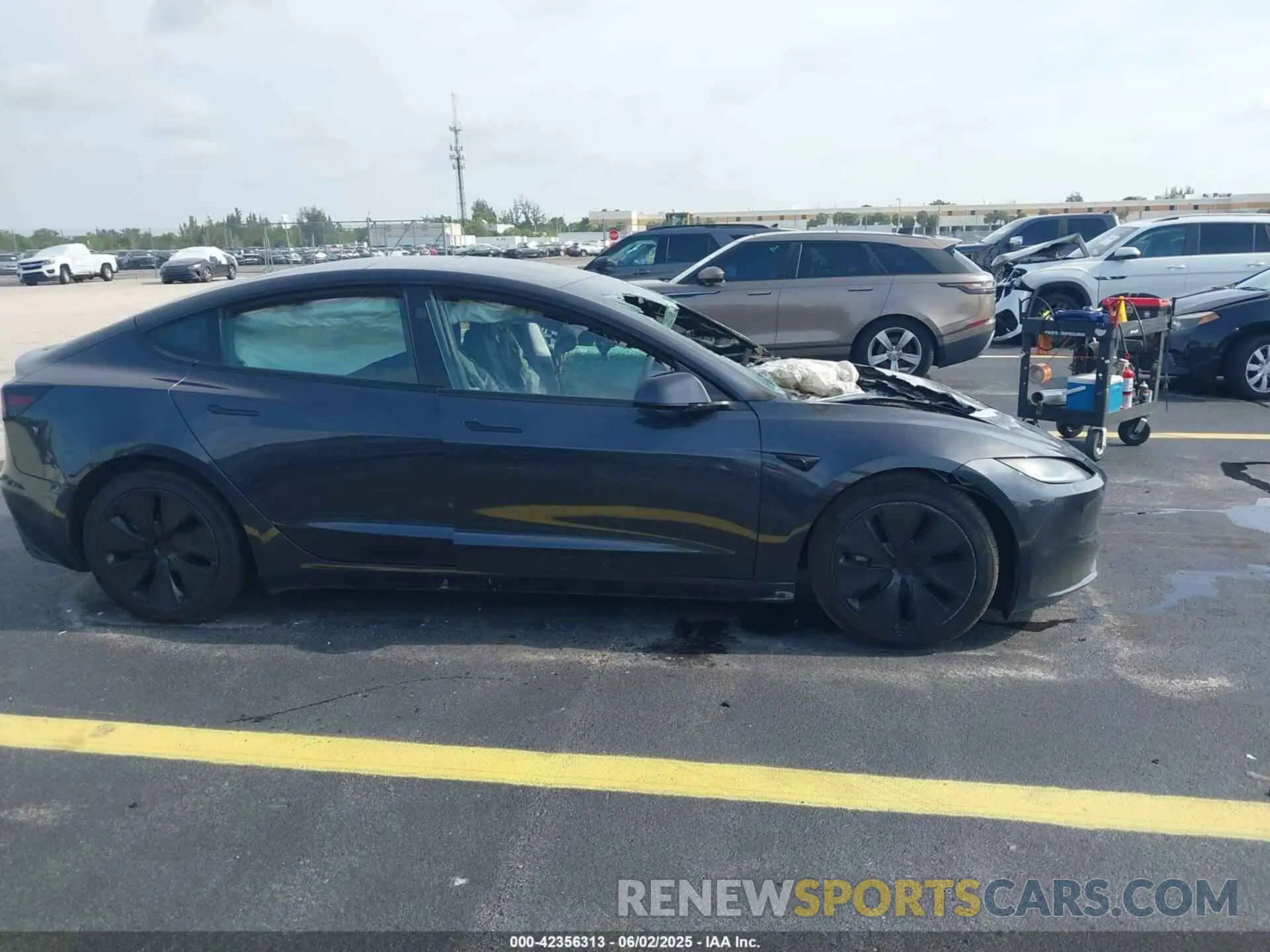 12 Photograph of a damaged car 5YJ3E1EA0RF748073 TESLA MODEL 3 2024