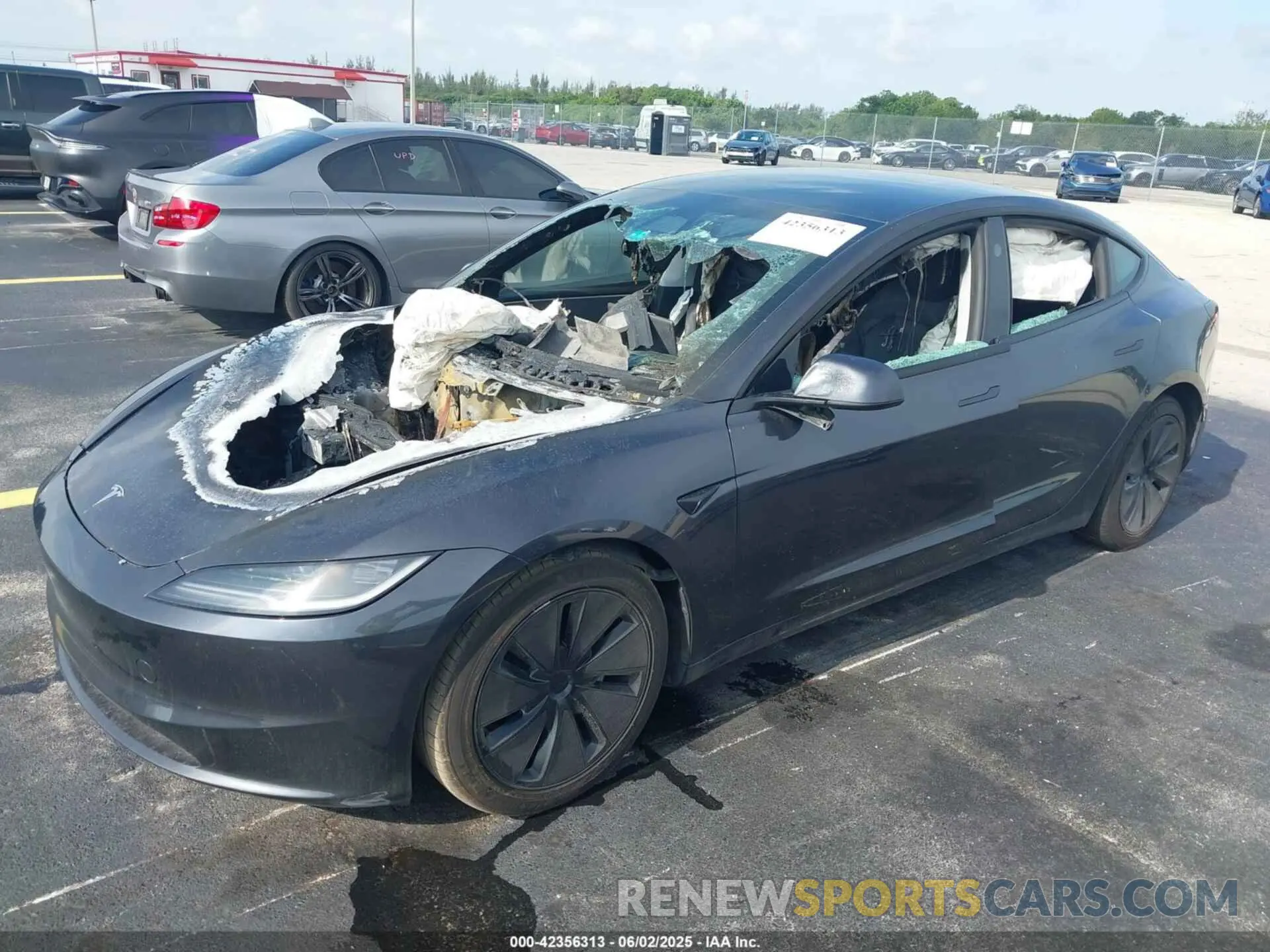 2 Photograph of a damaged car 5YJ3E1EA0RF748073 TESLA MODEL 3 2024