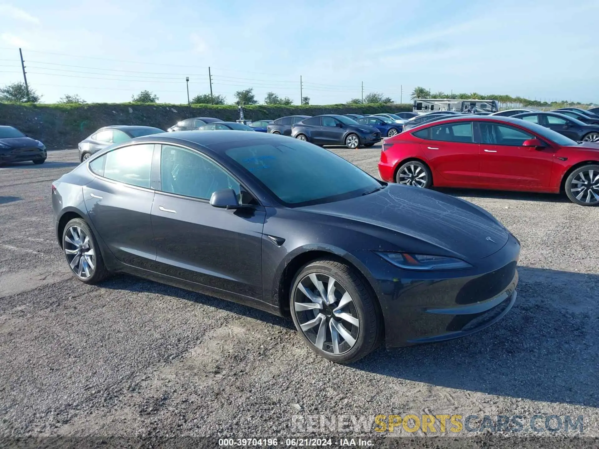 1 Photograph of a damaged car 5YJ3E1EA0RF752074 TESLA MODEL 3 2024