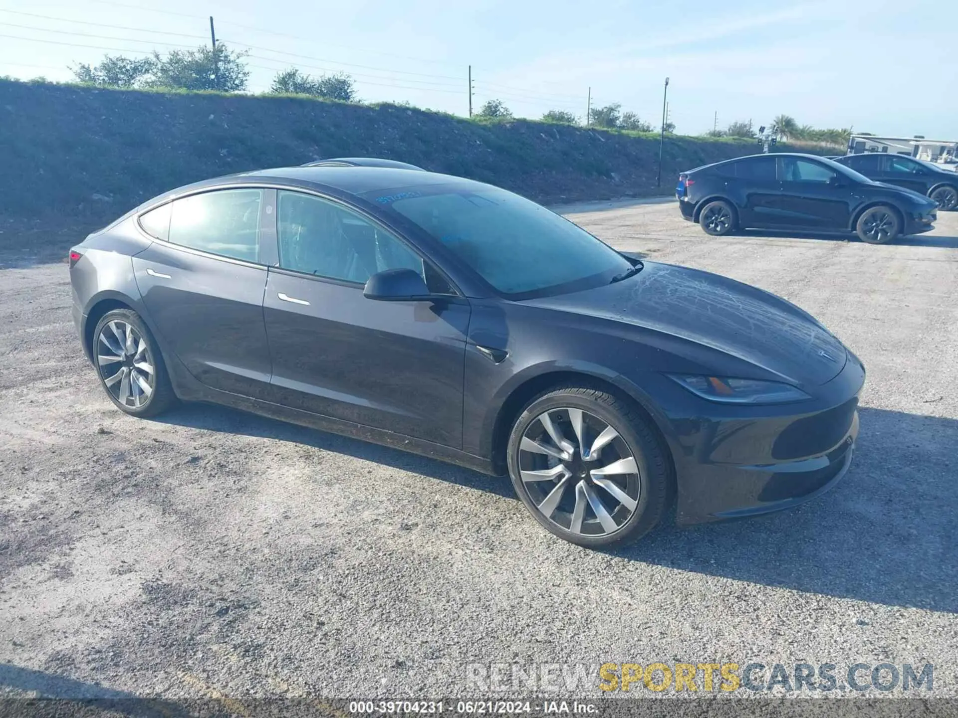 1 Photograph of a damaged car 5YJ3E1EA0RF752107 TESLA MODEL 3 2024