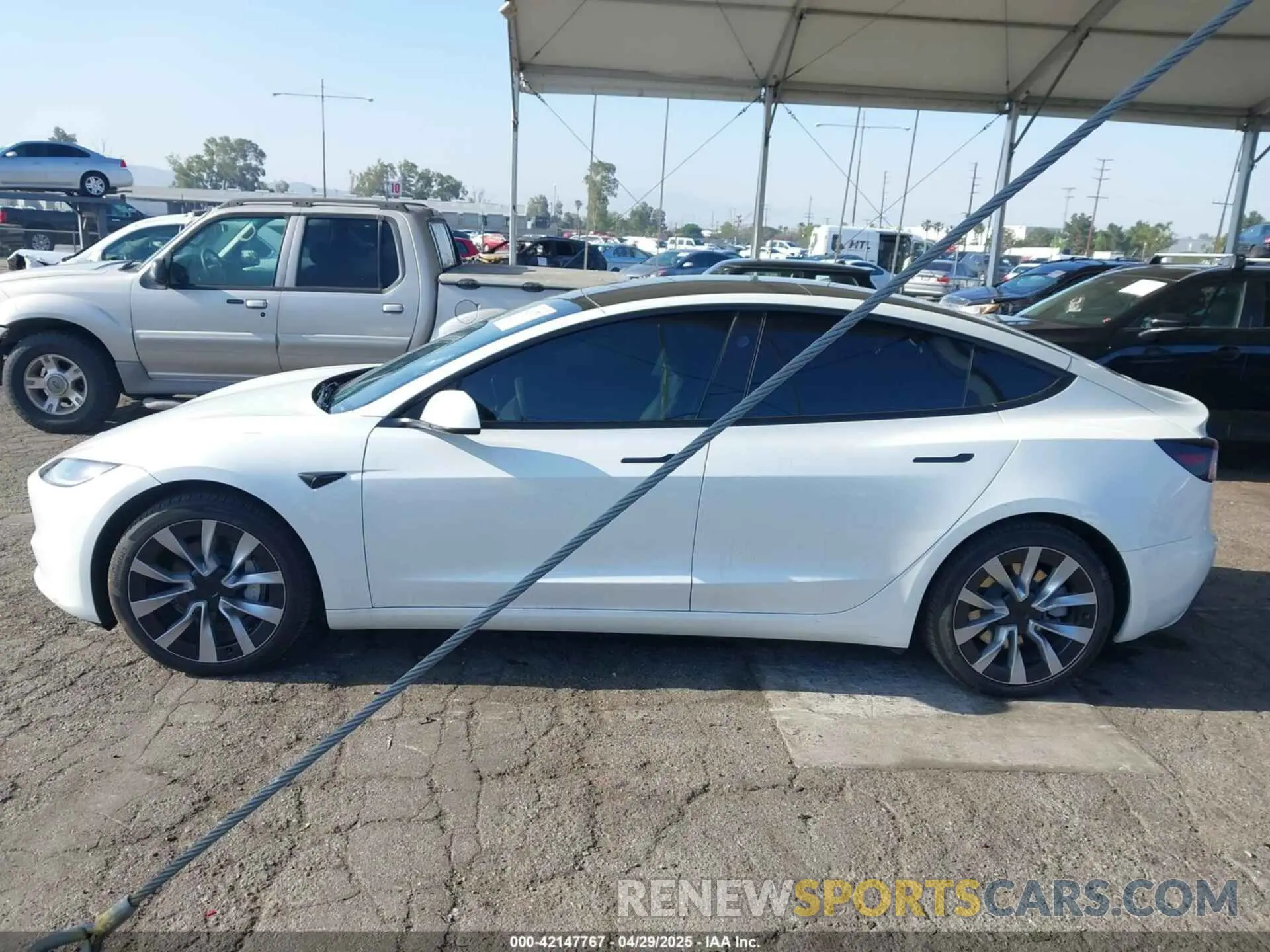 14 Photograph of a damaged car 5YJ3E1EA0RF752172 TESLA MODEL 3 2024