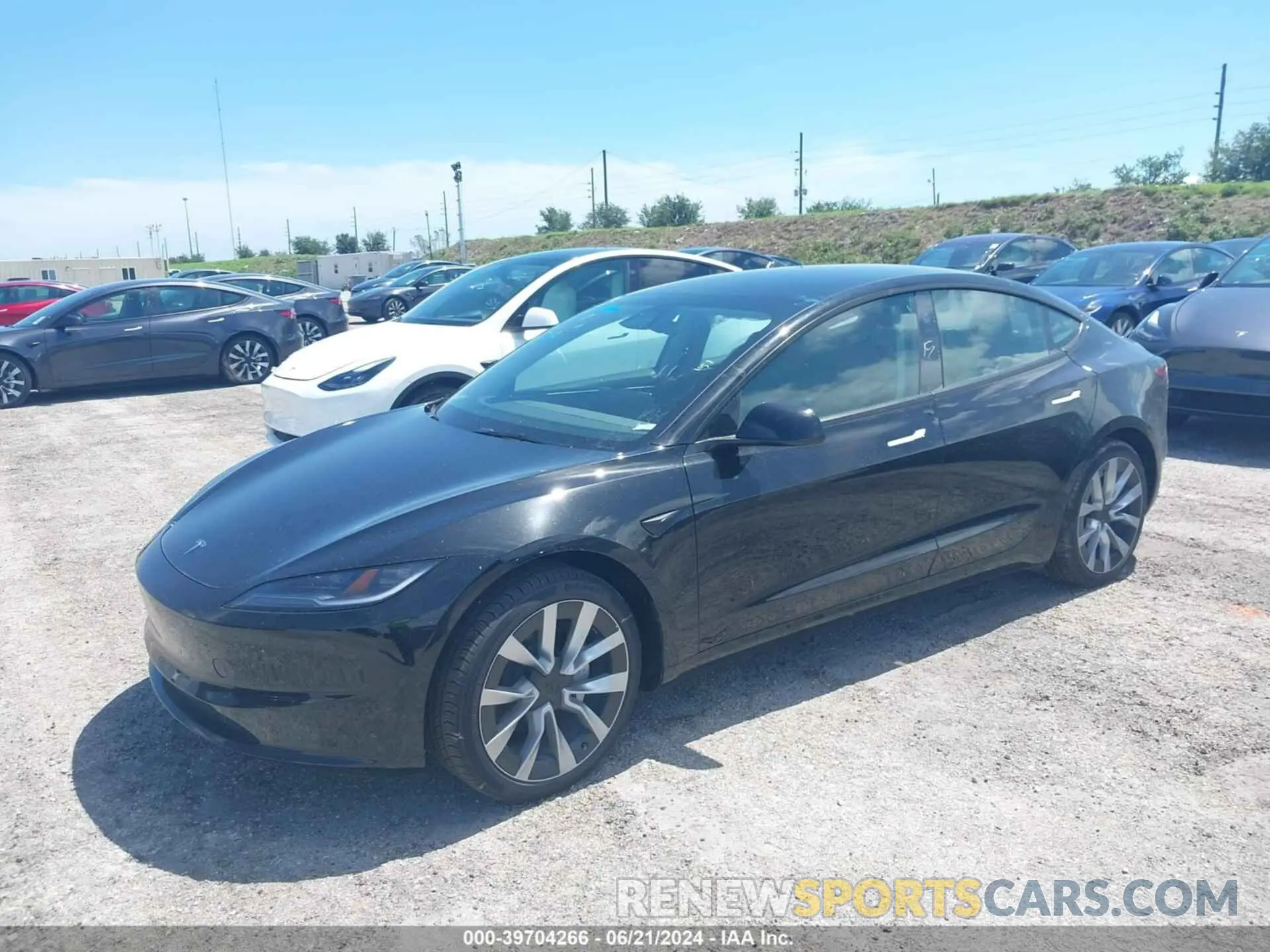 2 Photograph of a damaged car 5YJ3E1EA0RF752477 TESLA MODEL 3 2024