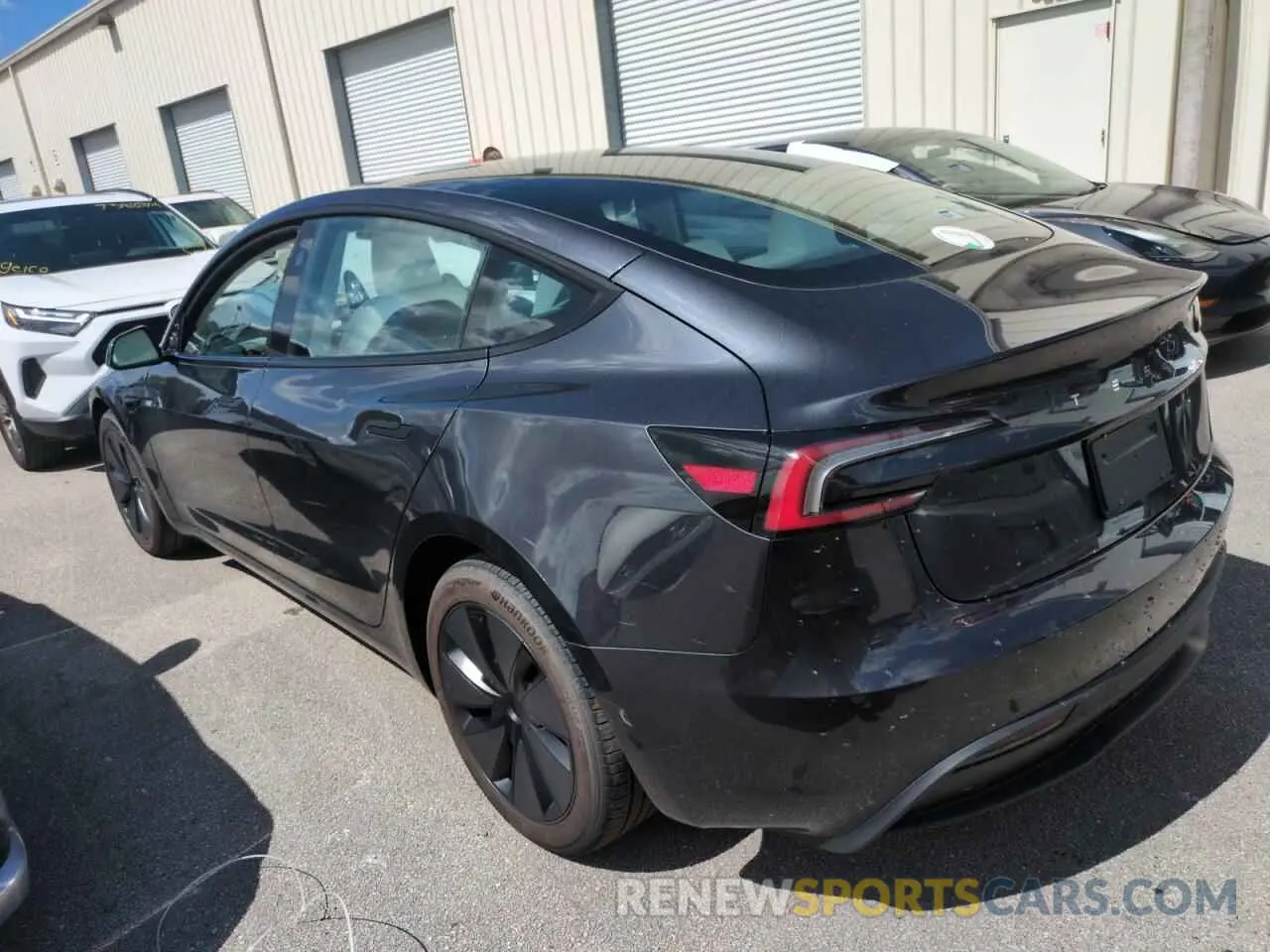 2 Photograph of a damaged car 5YJ3E1EA0RF800401 TESLA MODEL 3 2024