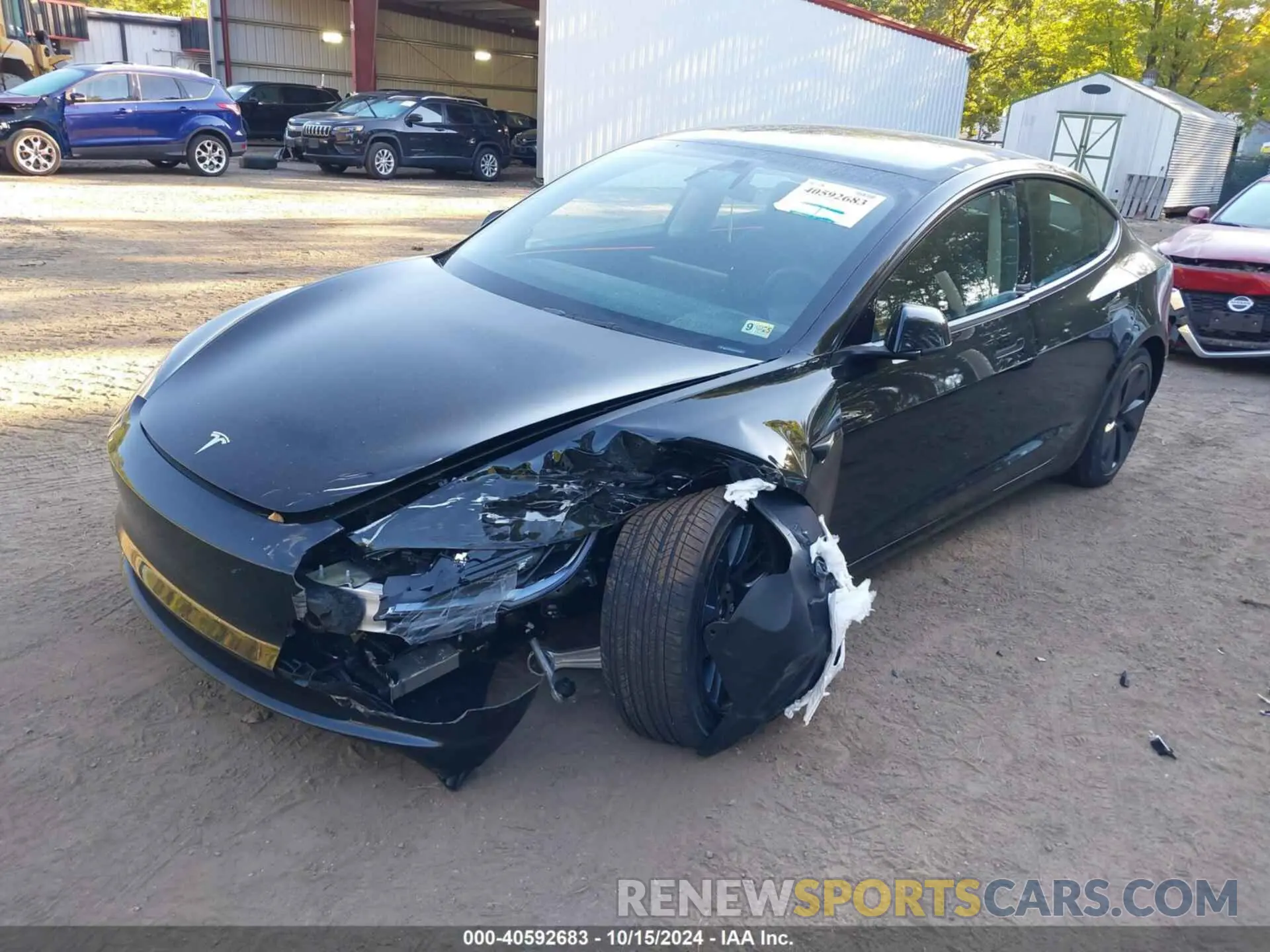 2 Photograph of a damaged car 5YJ3E1EA0RF843569 TESLA MODEL 3 2024