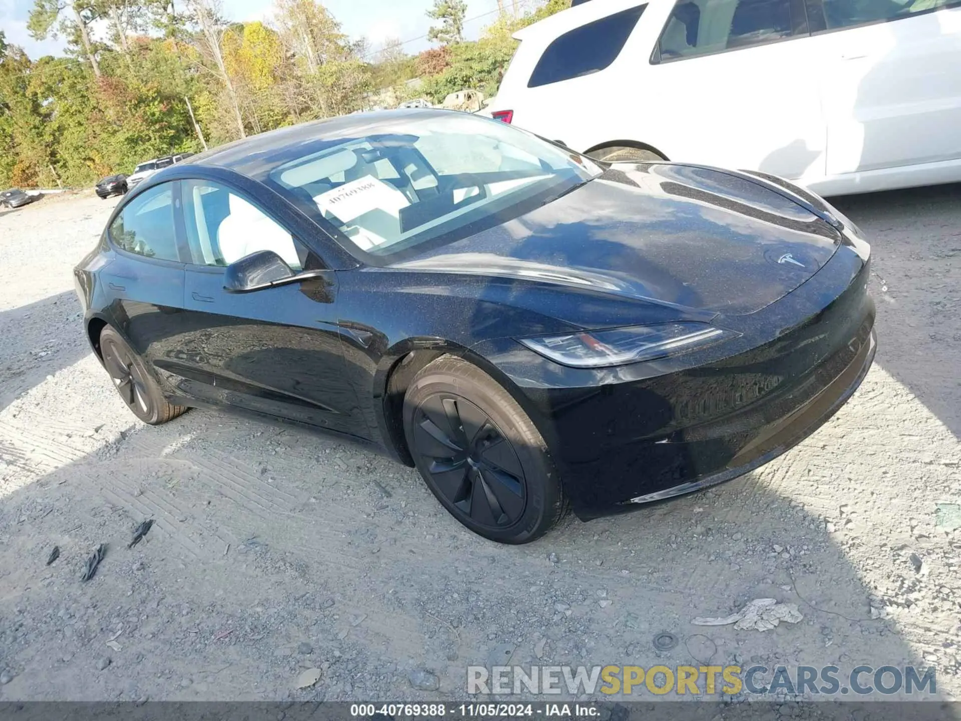 1 Photograph of a damaged car 5YJ3E1EA0RF848822 TESLA MODEL 3 2024