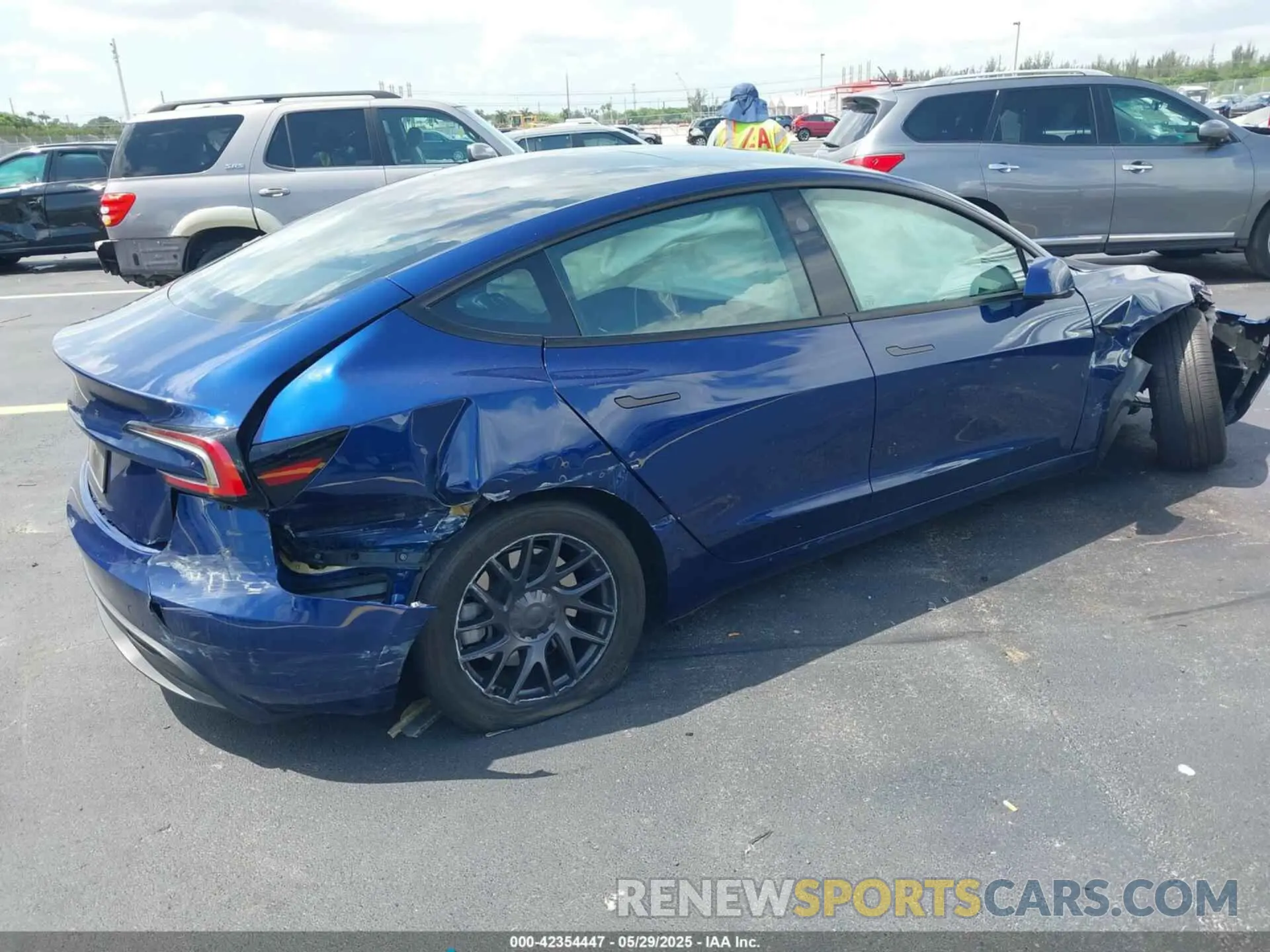 4 Photograph of a damaged car 5YJ3E1EA1RF744291 TESLA MODEL 3 2024