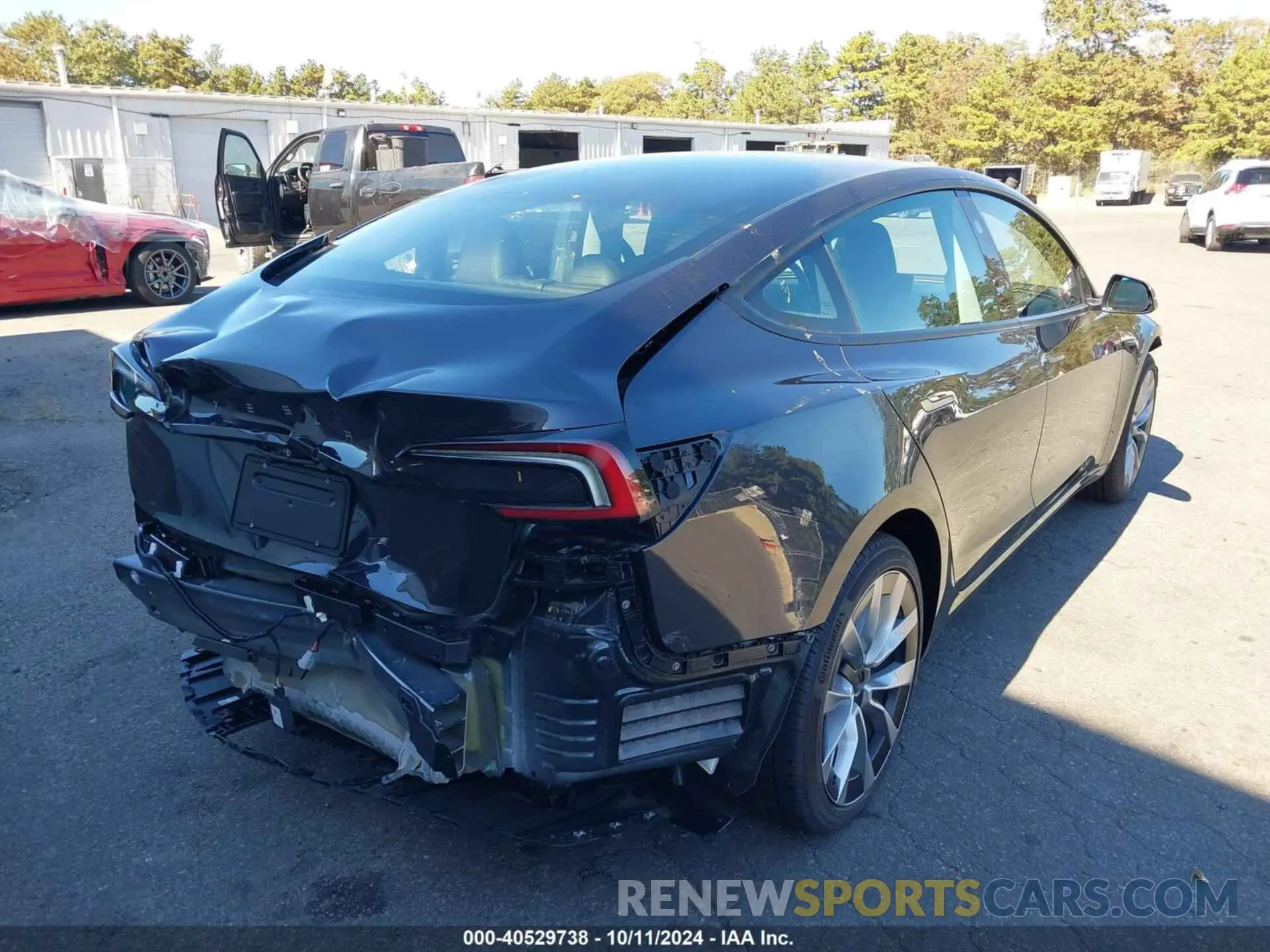 4 Photograph of a damaged car 5YJ3E1EA1RF751516 TESLA MODEL 3 2024