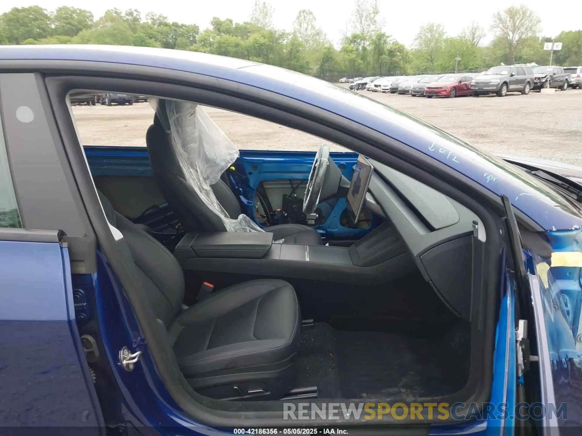 5 Photograph of a damaged car 5YJ3E1EA1RF830569 TESLA MODEL 3 2024