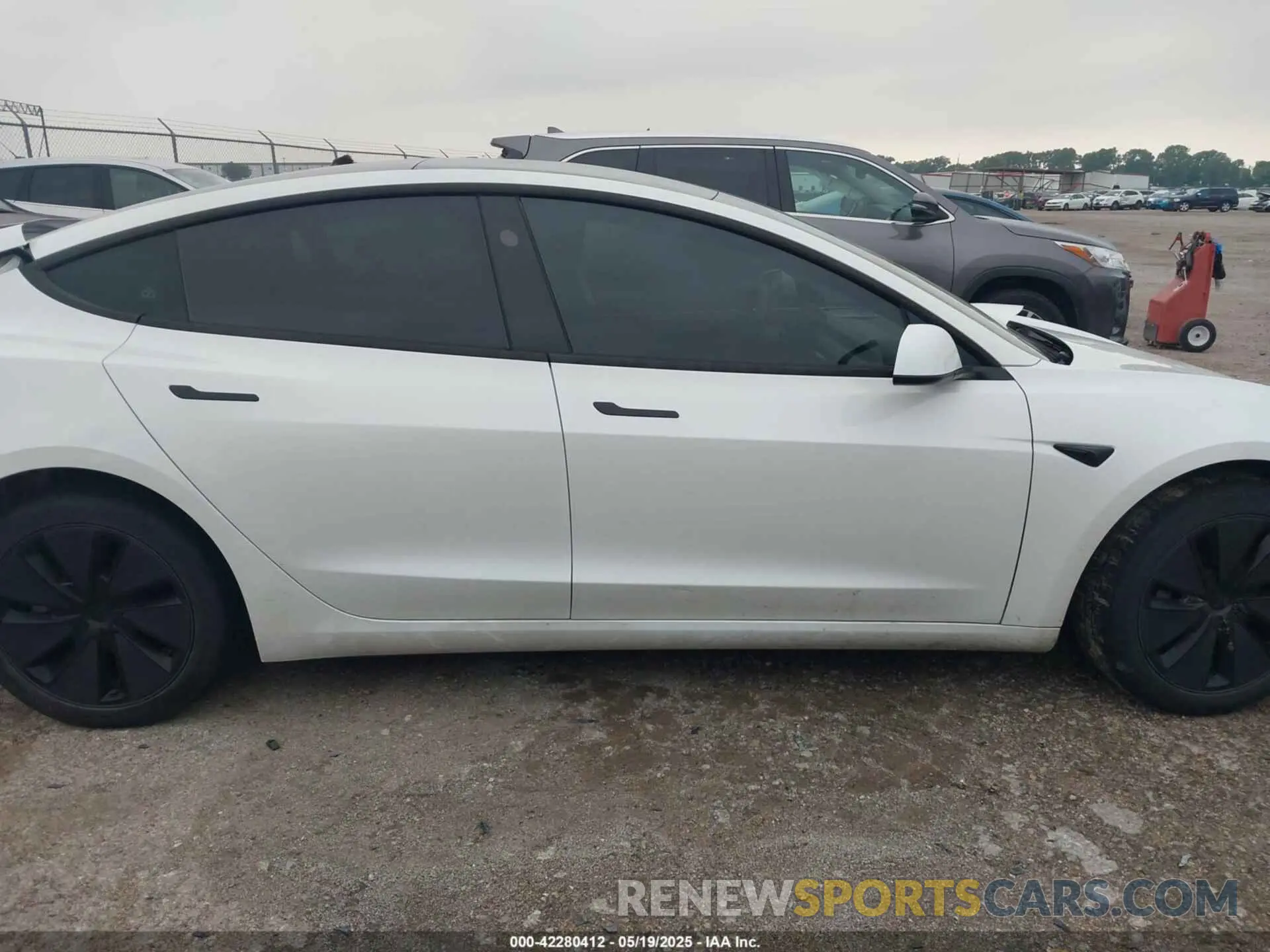 12 Photograph of a damaged car 5YJ3E1EA2RF731579 TESLA MODEL 3 2024