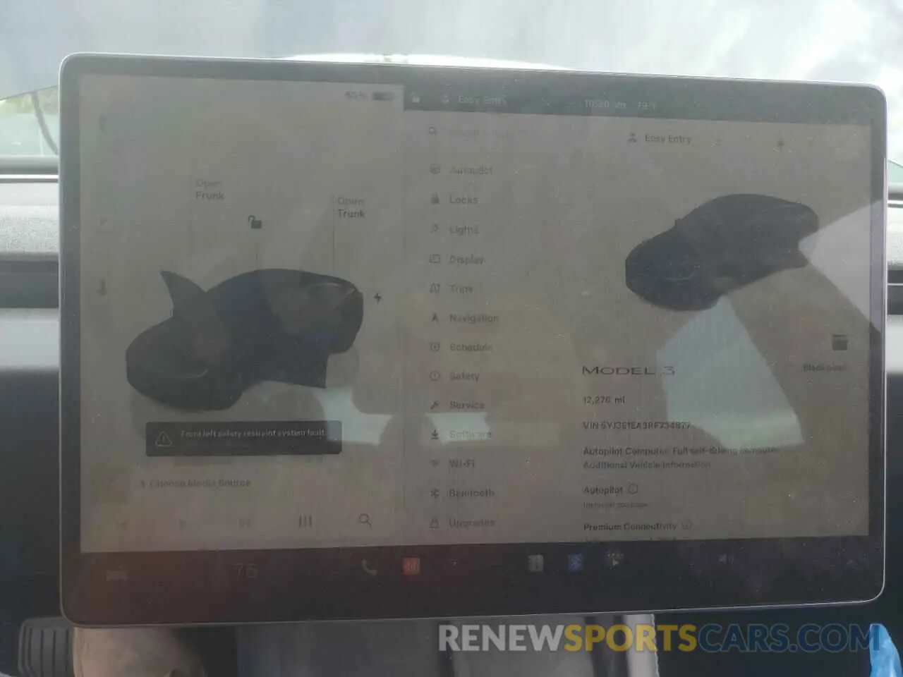 9 Photograph of a damaged car 5YJ3E1EA3RF734877 TESLA MODEL 3 2024