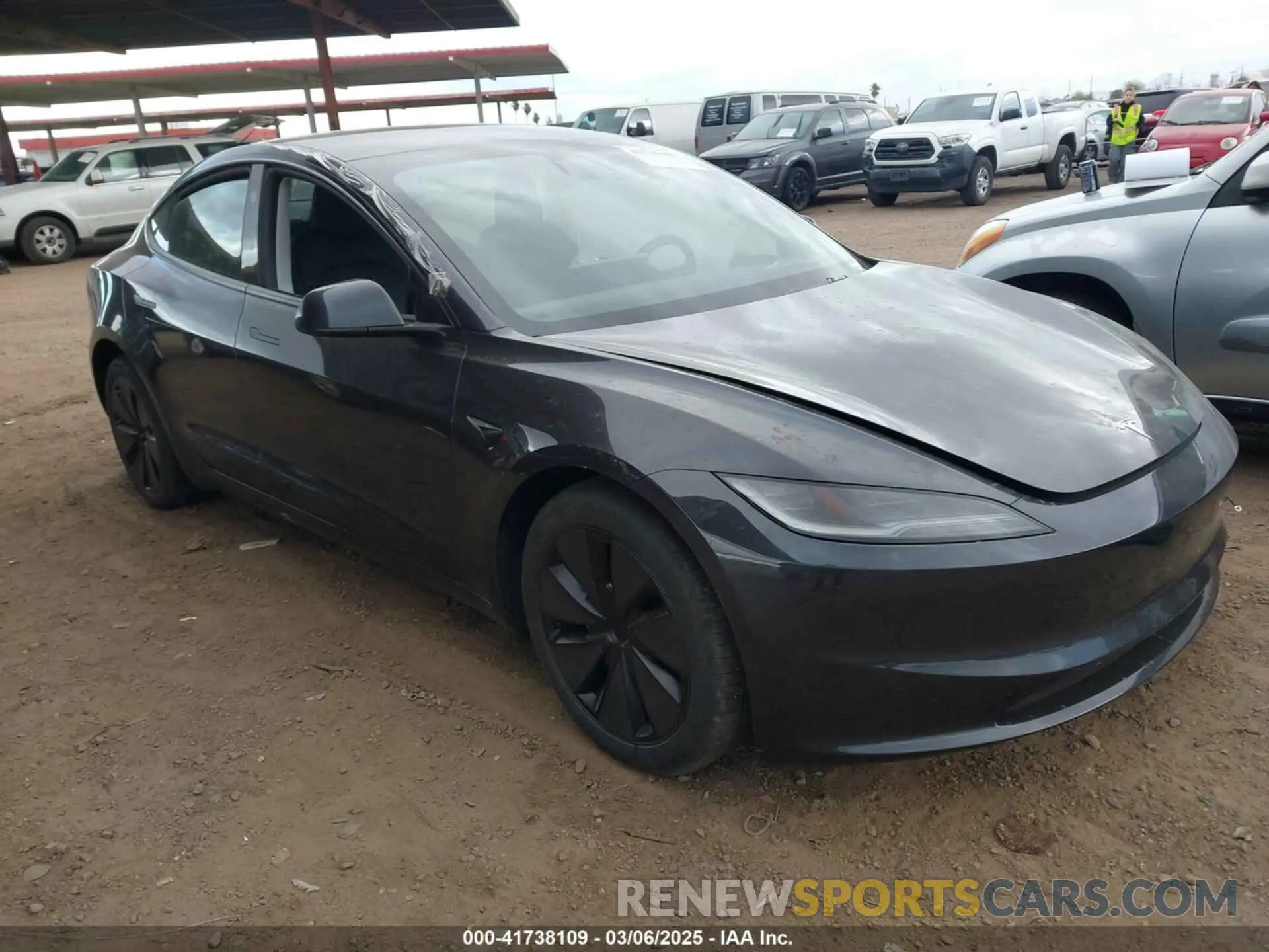 1 Photograph of a damaged car 5YJ3E1EA3RF771010 TESLA MODEL 3 2024