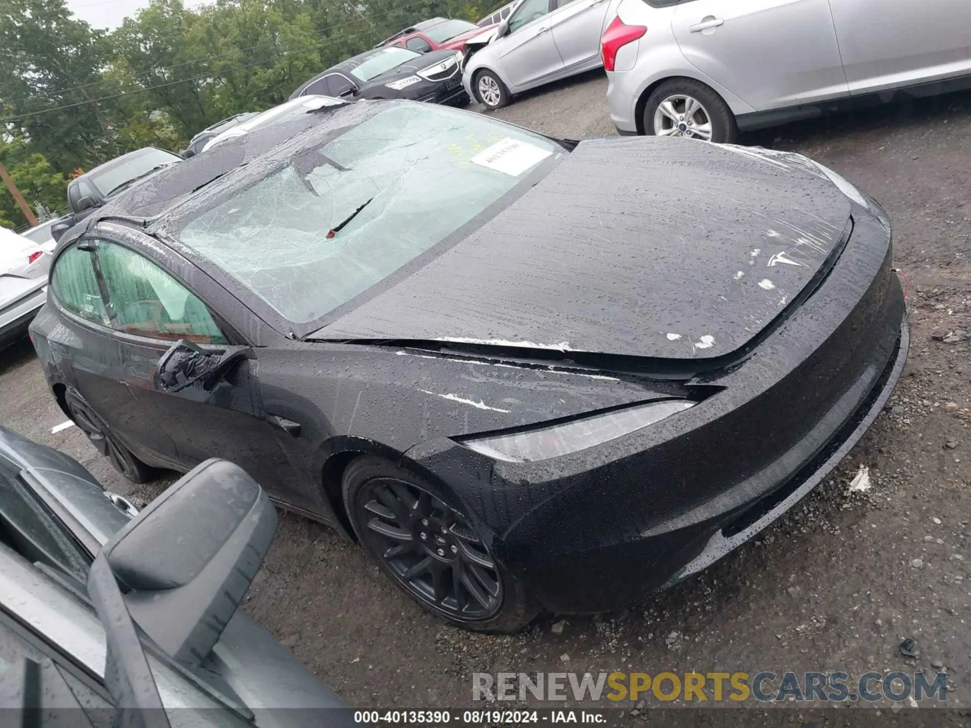 1 Photograph of a damaged car 5YJ3E1EA3RF782170 TESLA MODEL 3 2024