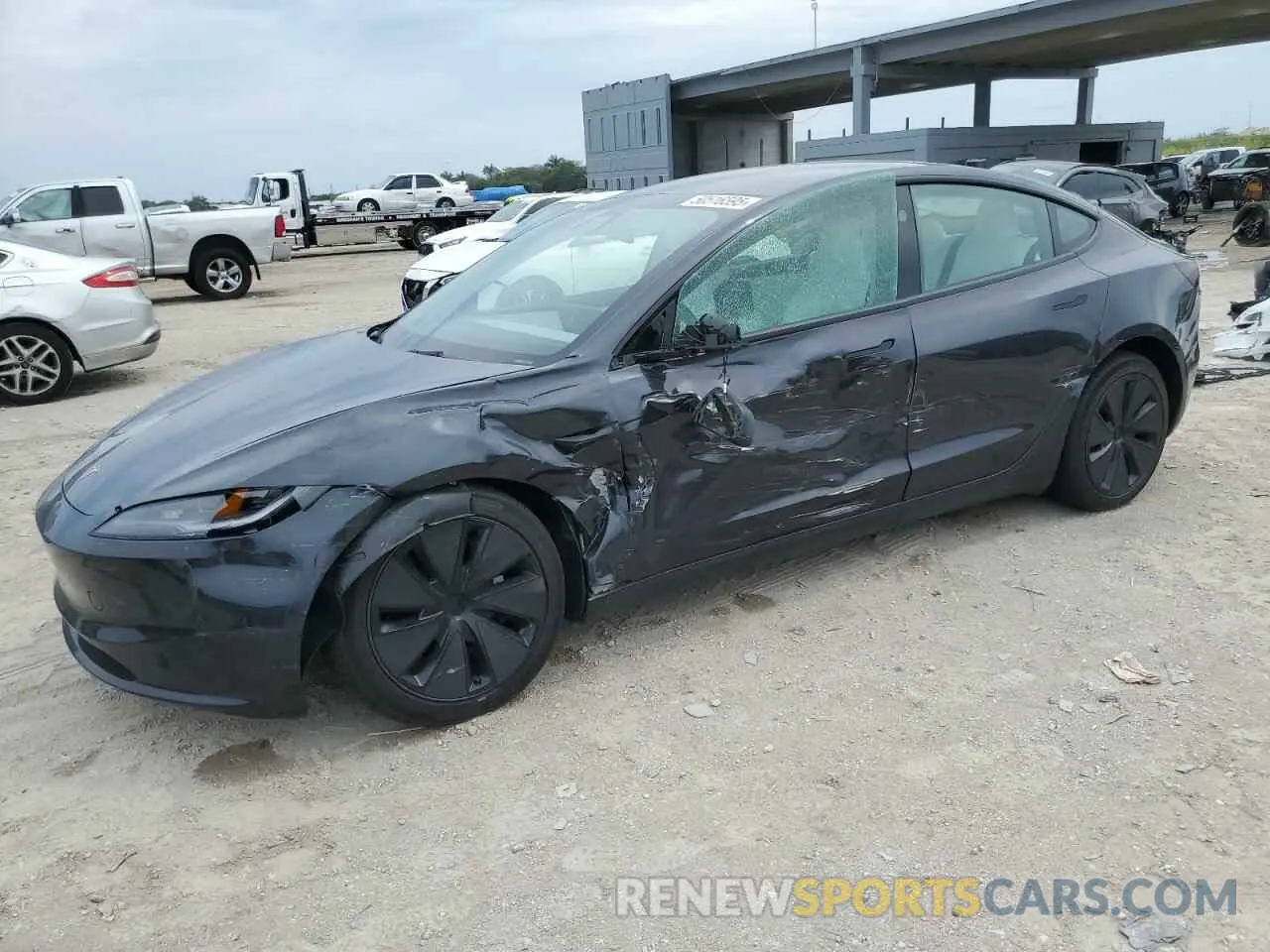 1 Photograph of a damaged car 5YJ3E1EA3RF858616 TESLA MODEL 3 2024