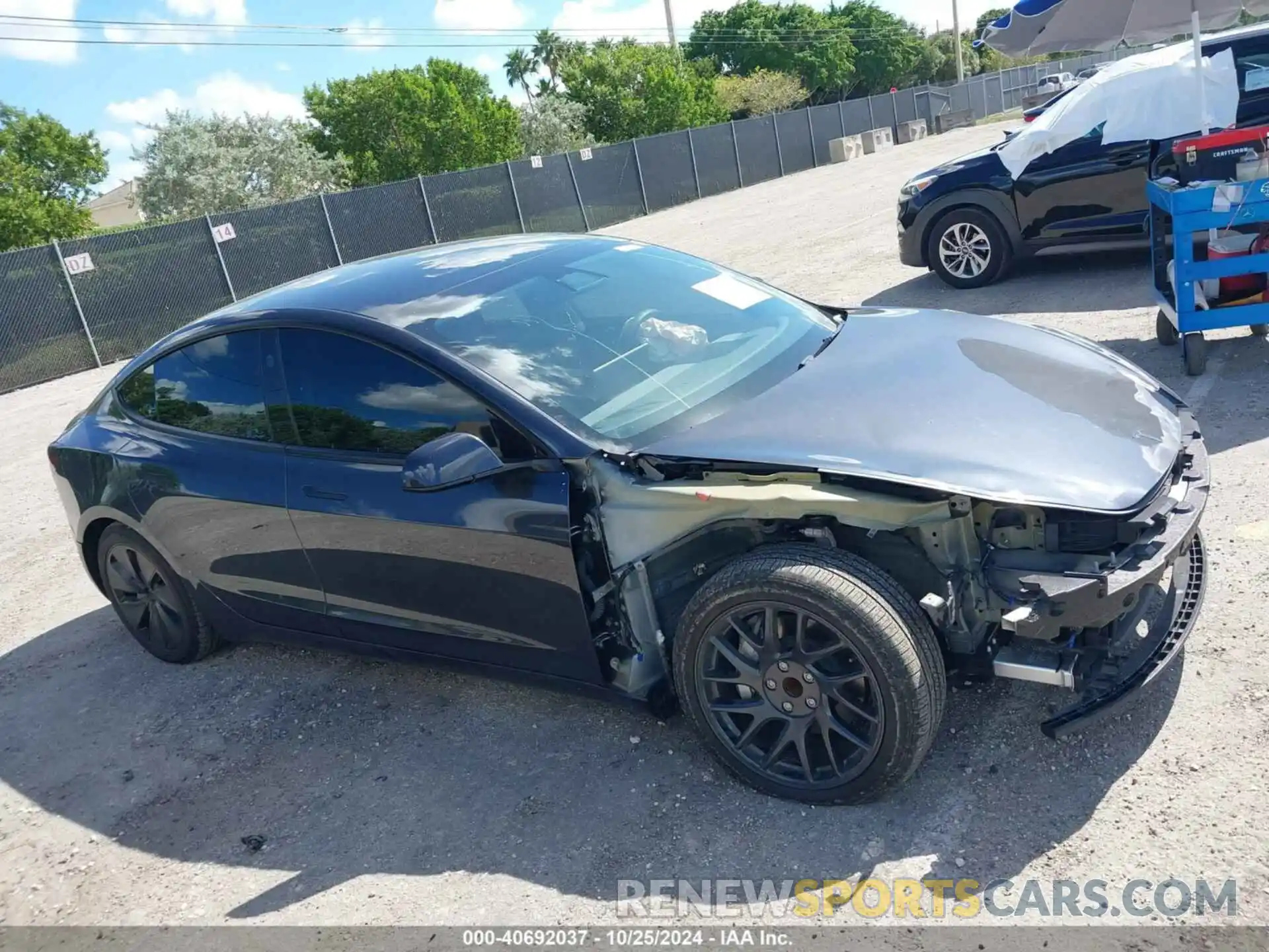 14 Photograph of a damaged car 5YJ3E1EA5RF728692 TESLA MODEL 3 2024