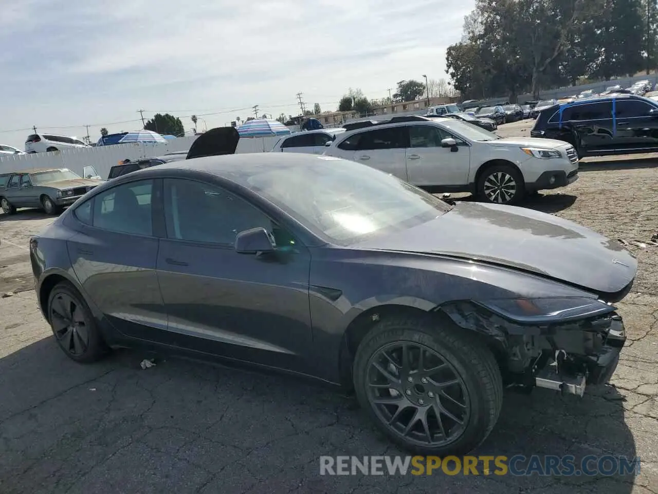 4 Photograph of a damaged car 5YJ3E1EA5RF857757 TESLA MODEL 3 2024