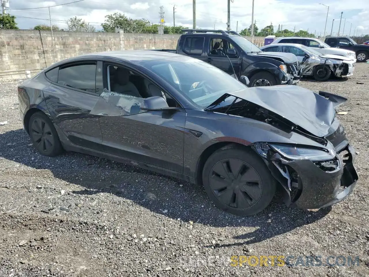 4 Photograph of a damaged car 5YJ3E1EA6RF740818 TESLA MODEL 3 2024