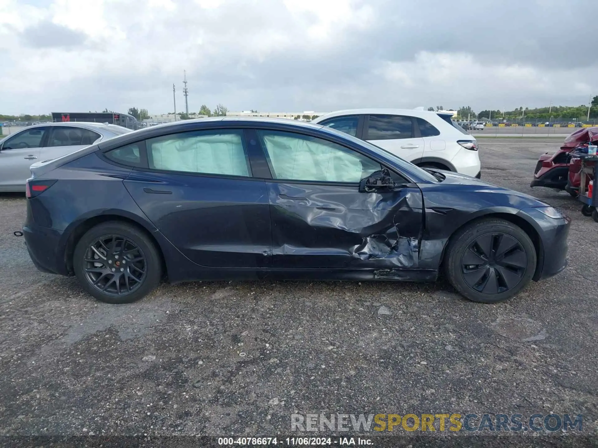 12 Photograph of a damaged car 5YJ3E1EA6RF756503 TESLA MODEL 3 2024