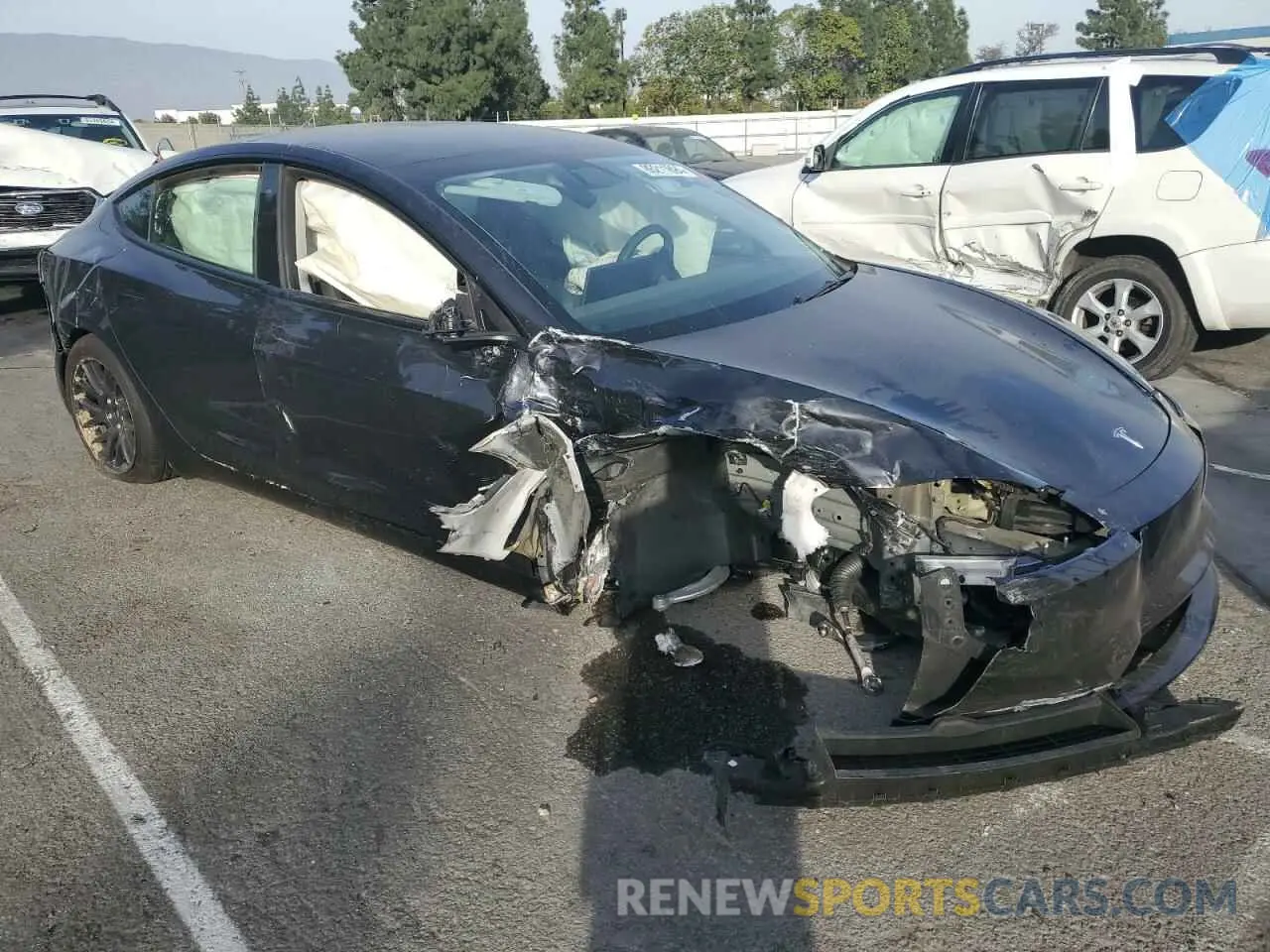 4 Photograph of a damaged car 5YJ3E1EA7RF733490 TESLA MODEL 3 2024