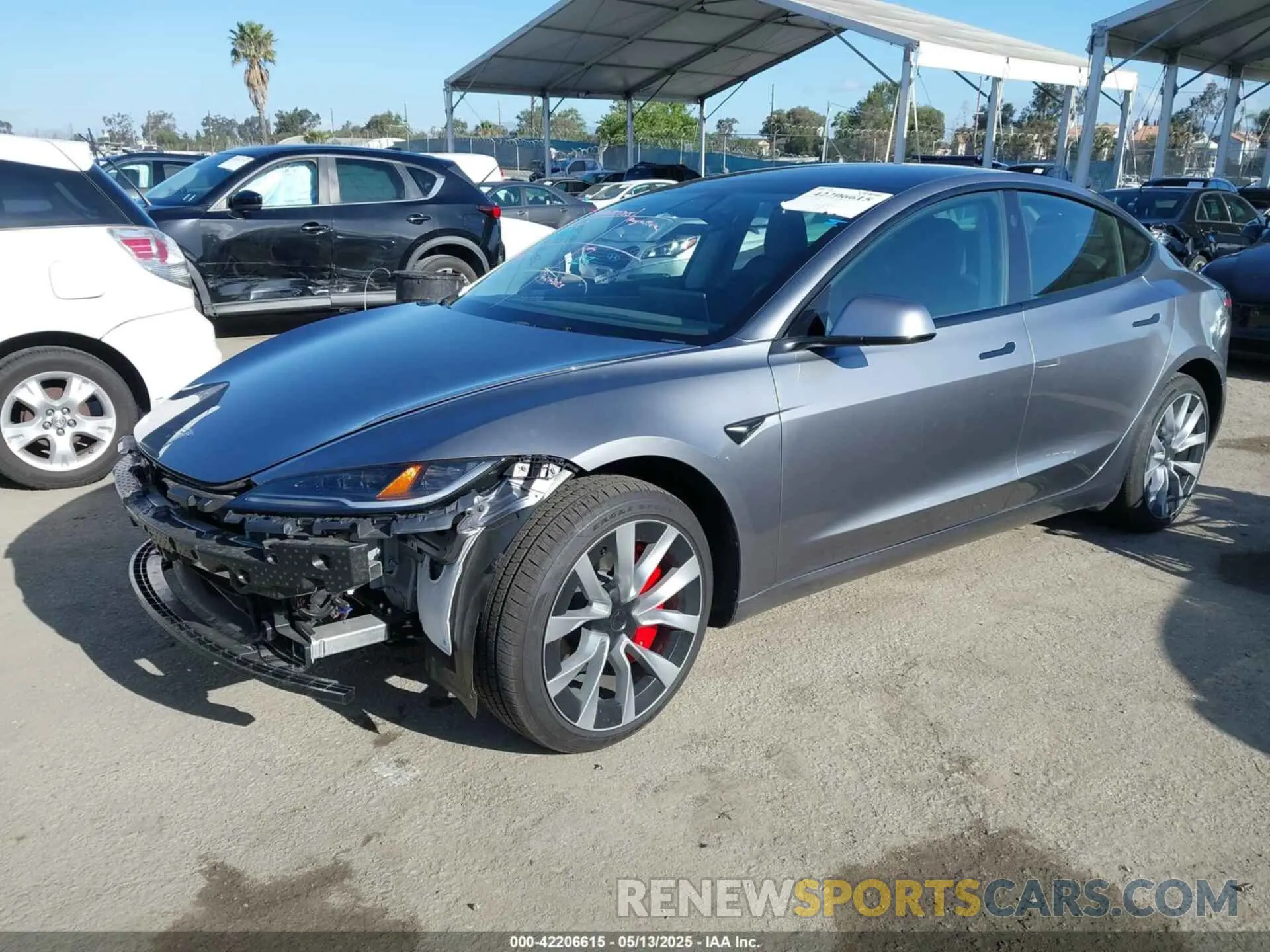 2 Photograph of a damaged car 5YJ3E1EA9RF870138 TESLA MODEL 3 2024