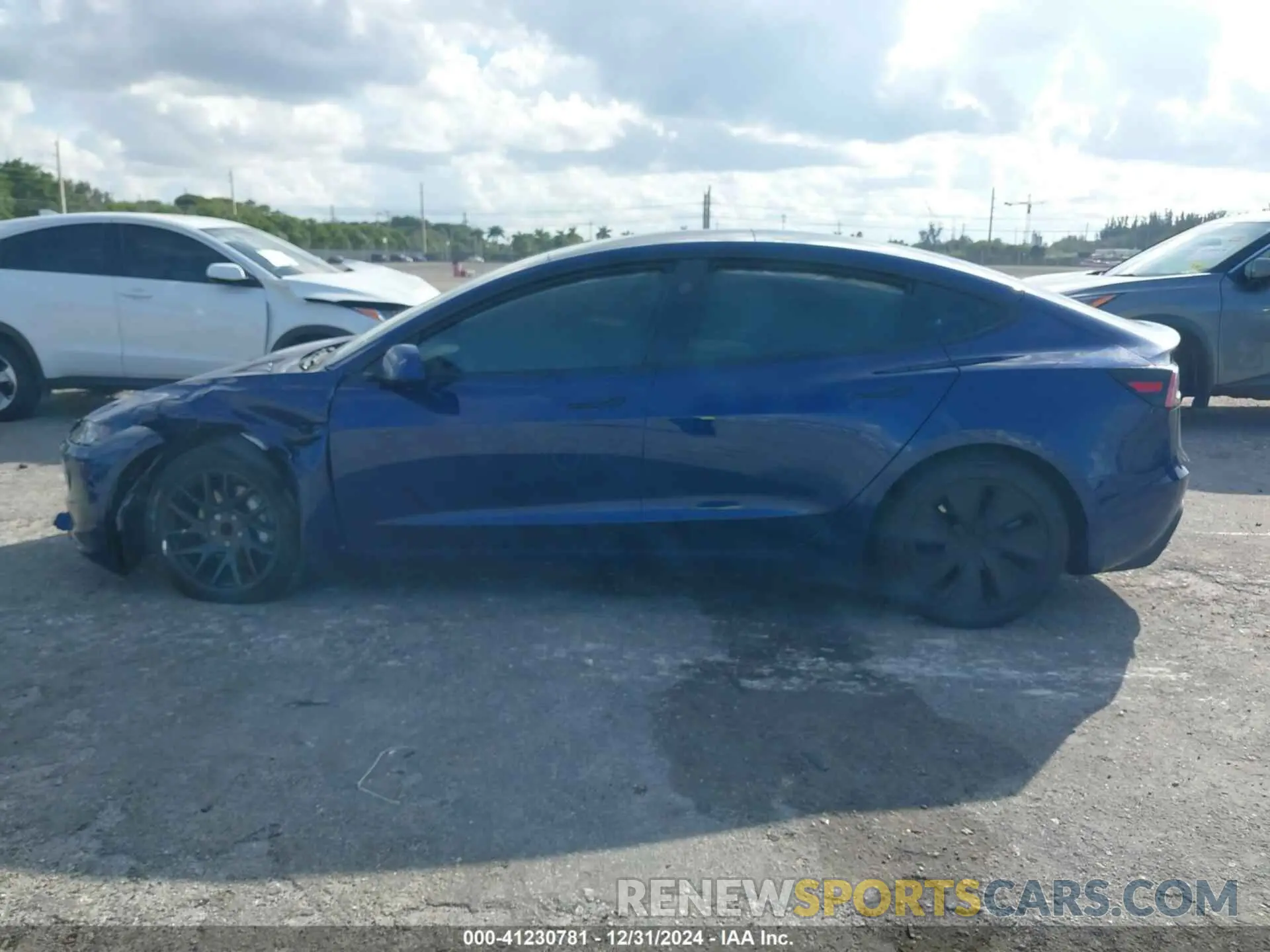 14 Photograph of a damaged car 5YJ3E1EAXRF744712 TESLA MODEL 3 2024