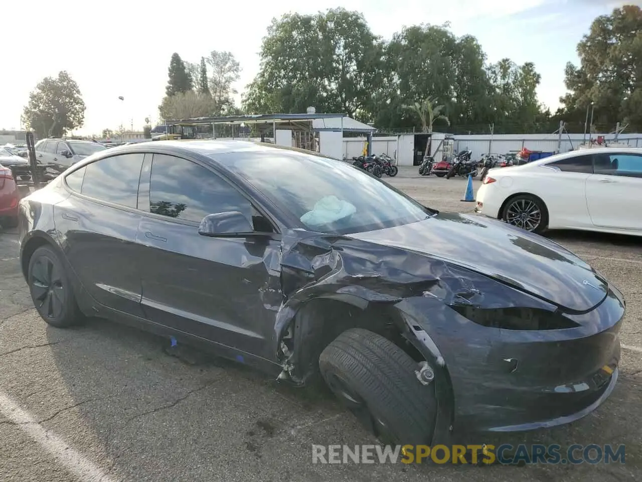 4 Photograph of a damaged car 5YJ3E1EAXRF749828 TESLA MODEL 3 2024