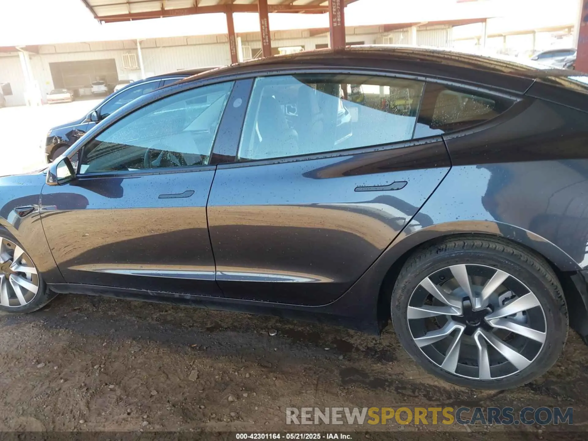 14 Photograph of a damaged car 5YJ3E1EAXRF750297 TESLA MODEL 3 2024