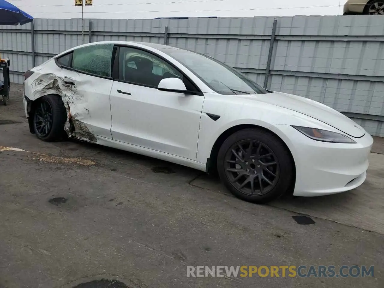 4 Photograph of a damaged car 5YJ3E1EAXRF856426 TESLA MODEL 3 2024