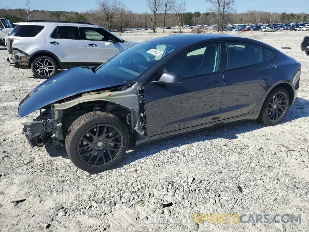 1 Photograph of a damaged car 5YJ3E1EB1RF799509 TESLA MODEL 3 2024