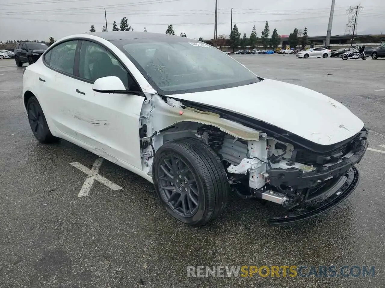 4 Photograph of a damaged car 5YJ3E1EB2RF819623 TESLA MODEL 3 2024