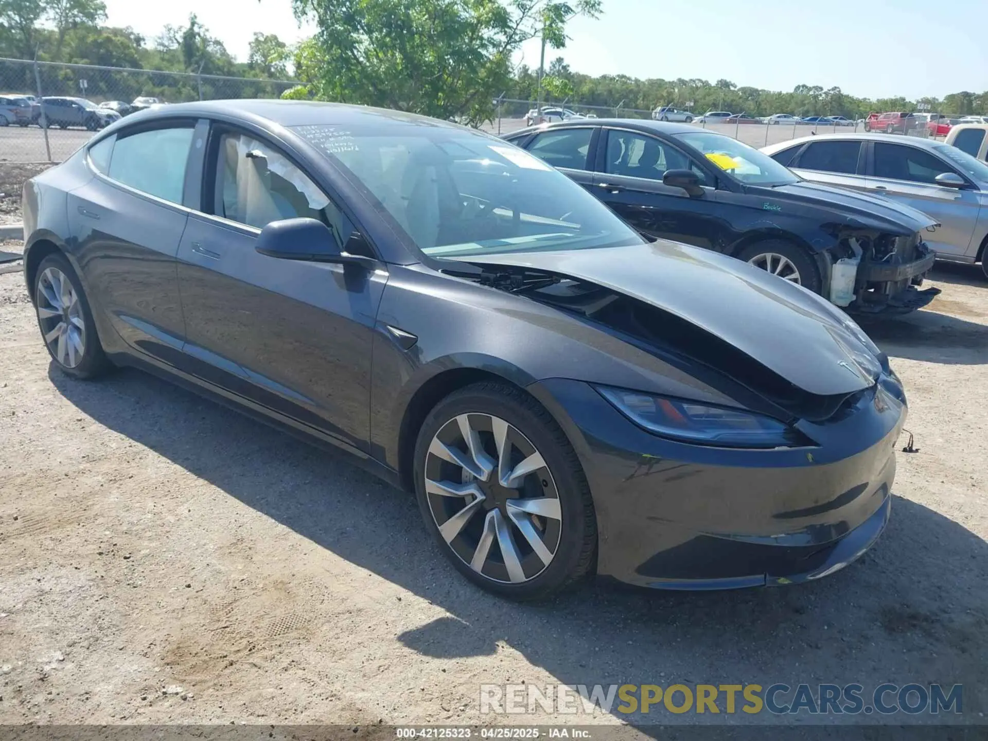 1 Photograph of a damaged car 5YJ3E1EB2RF832663 TESLA MODEL 3 2024